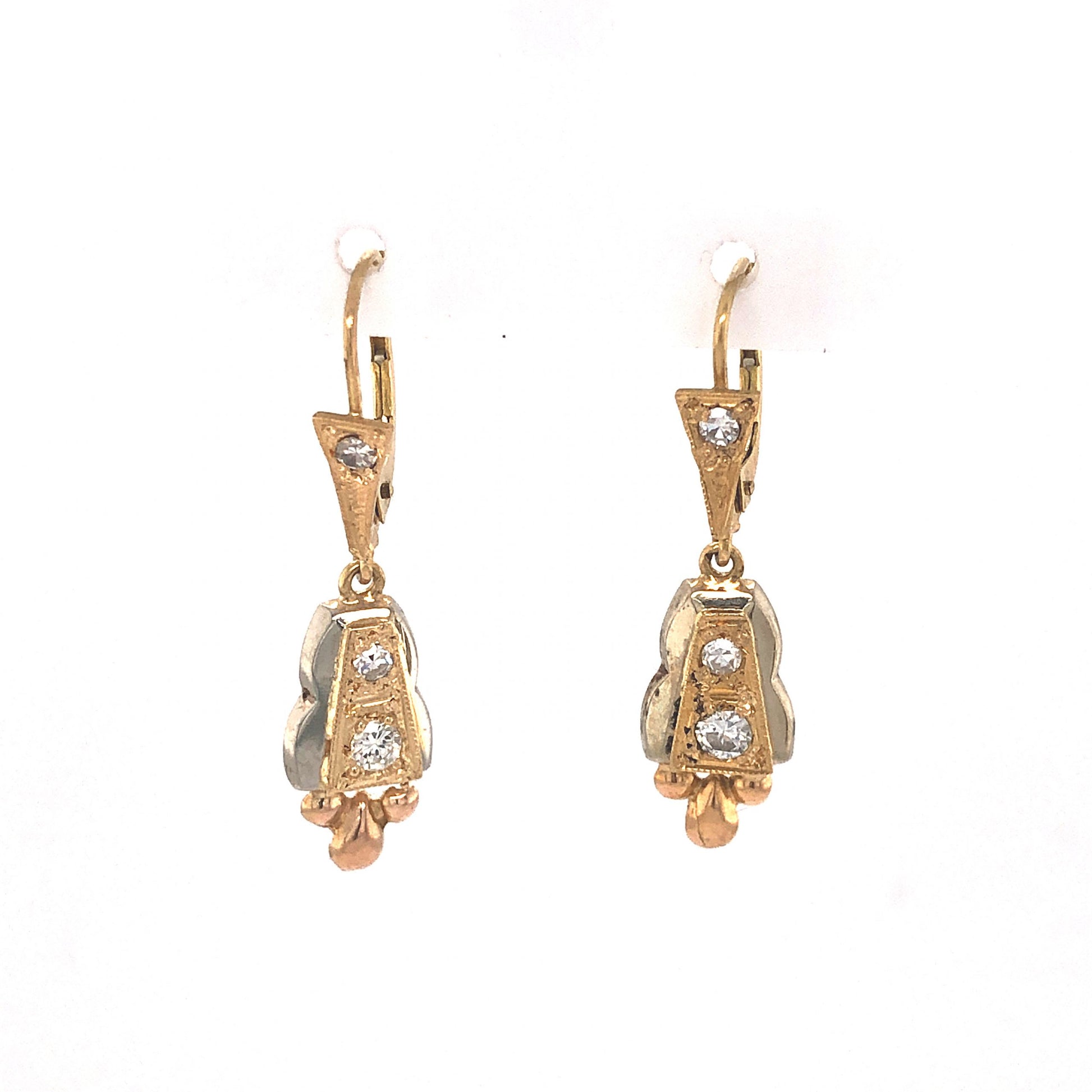 Mid-Century Diamond Drop Earrings in 18k GoldComposition: PlatinumTotal Diamond Weight: .22 ctTotal Gram Weight: 1.8 gInscription: 750