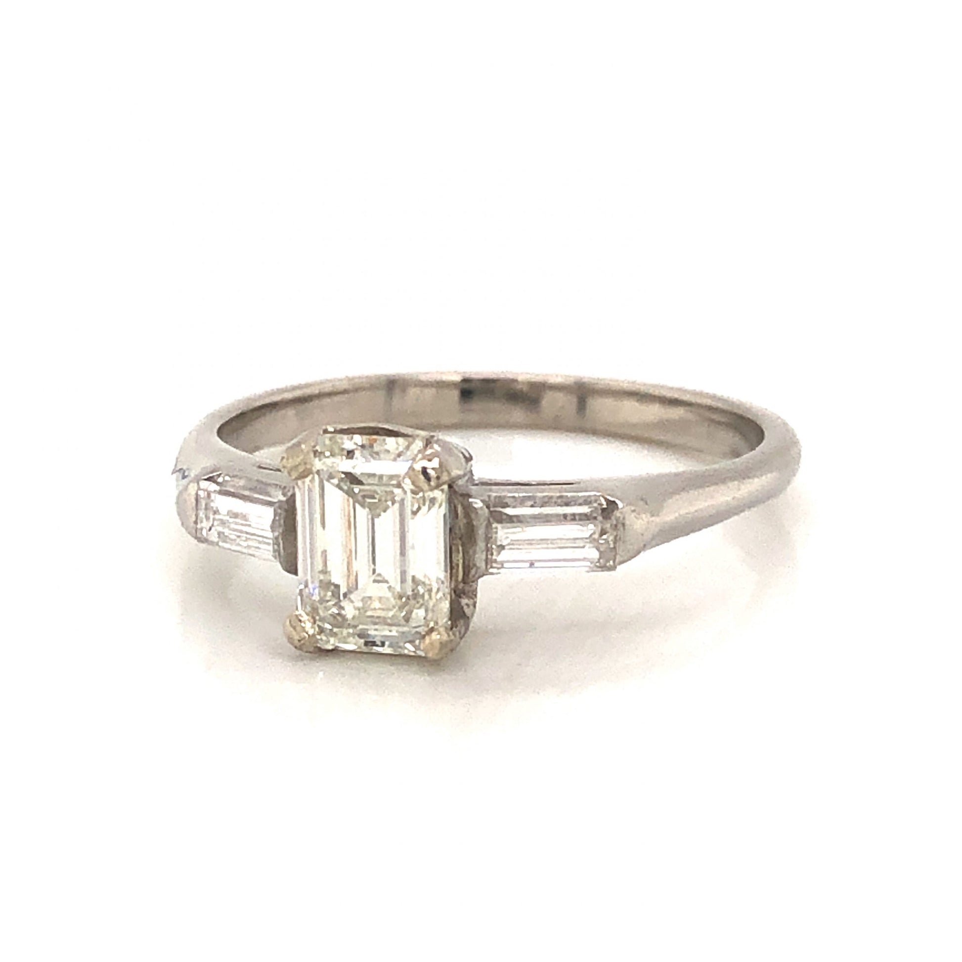 Vintage .63 Emerald Cut Diamond Engagement Ring in Platinum