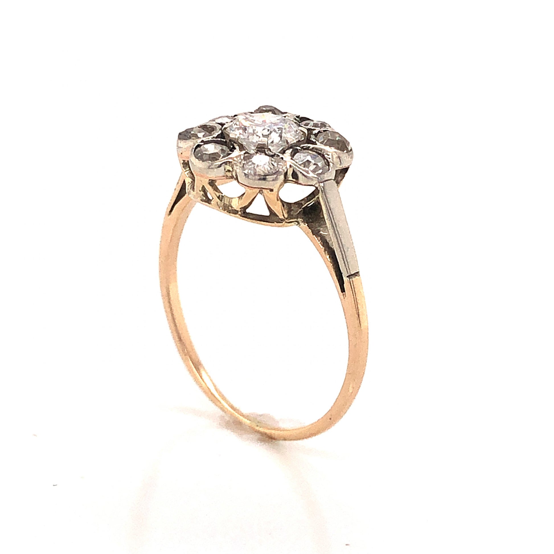 Victorian Bezel Set Diamond Cluster Engagement Ring in Silver & 14kComposition: Sterling Silver/14 Karat Yellow Gold Ring Size: 6 Total Diamond Weight: .78ct Total Gram Weight: 1.8 g