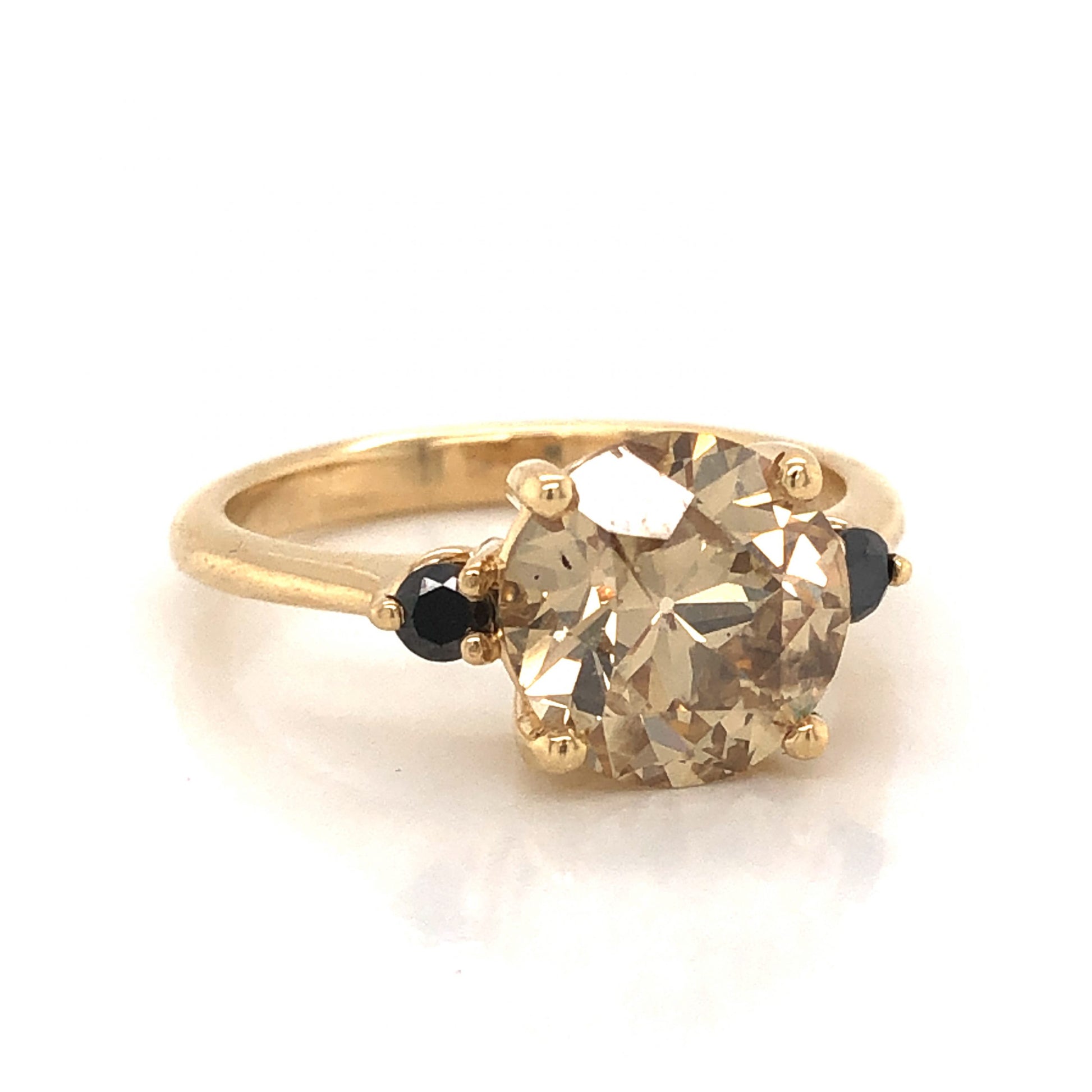 Fancy Light Brown Diamond Engagement Ring in 14k Yellow GoldComposition: 14 Karat Yellow GoldRing Size: 6.5Total Diamond Weight: 2.87 ctTotal Gram Weight: 3.6 gInscription: 14k 