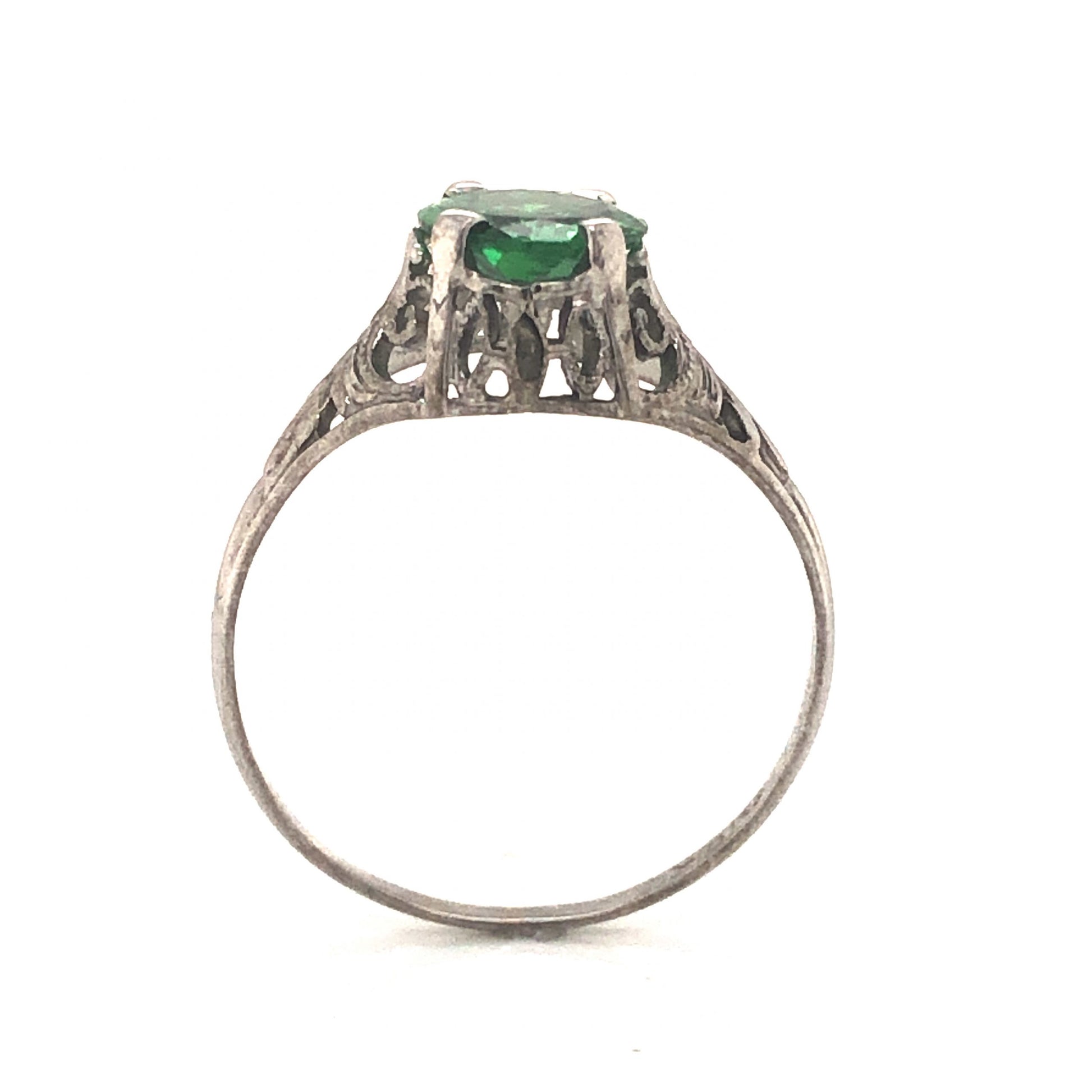 Art Deco Tsavorite Garnet Engagement Ring in 18k White GoldComposition: 18 Karat White Gold Ring Size: 7 Total Gram Weight: 2.0 g Inscription: 18kt
      