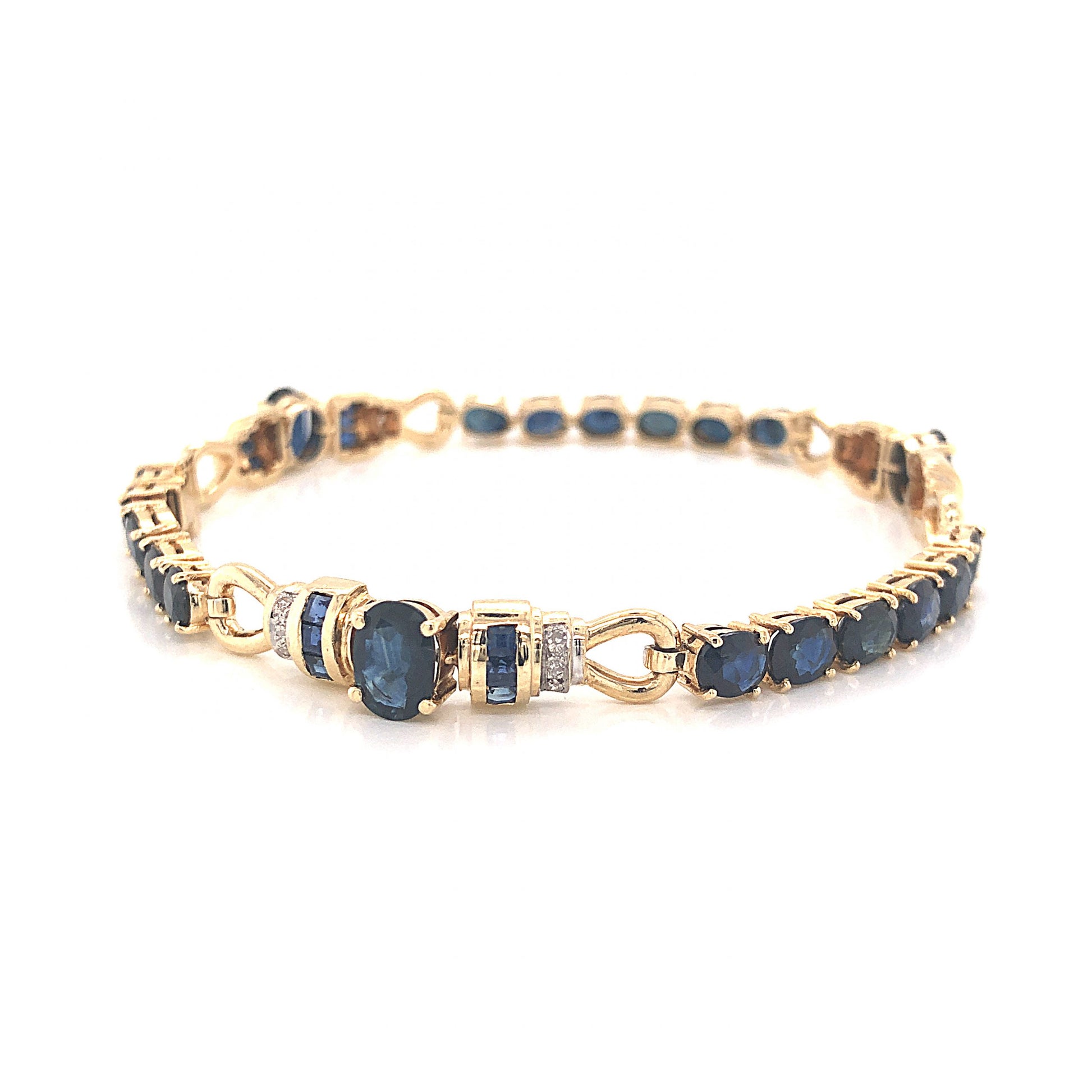 Oval Cut Sapphire Bracelet w/ Diamonds in 14k Yellow GoldComposition: 14 Karat Yellow GoldTotal Diamond Weight: .09 ctTotal Gram Weight: 12.7 gInscription: 585