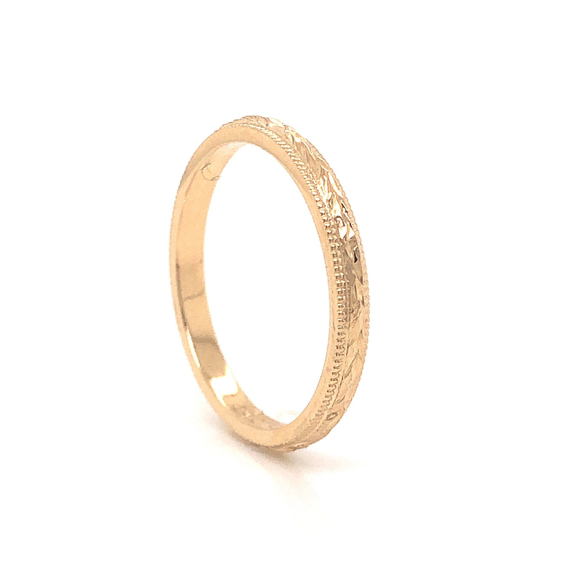 Vintage Inspired Engraved Wedding Band in 14k Yellow GoldComposition: 14 Karat Yellow GoldRing Size: 6Total Gram Weight: 1.8 gInscription: B&N 585