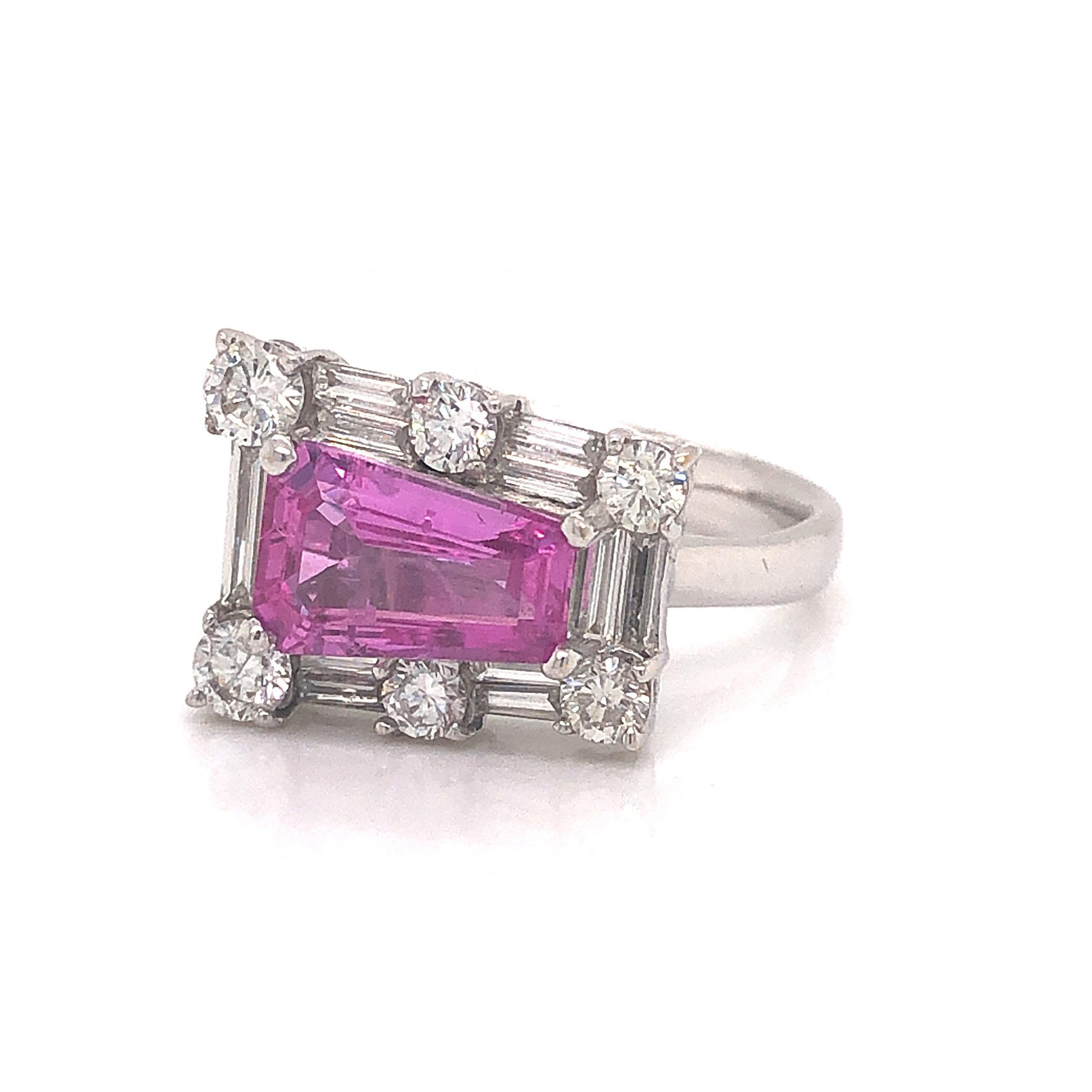 Pink Sapphire & Diamond Cocktail Ring in 18k White GoldComposition: 18 Karat White Gold Ring Size: 6 Total Diamond Weight: .63ct Total Gram Weight: 5.3 g Inscription: K18WG 1.86 D 0.63
      