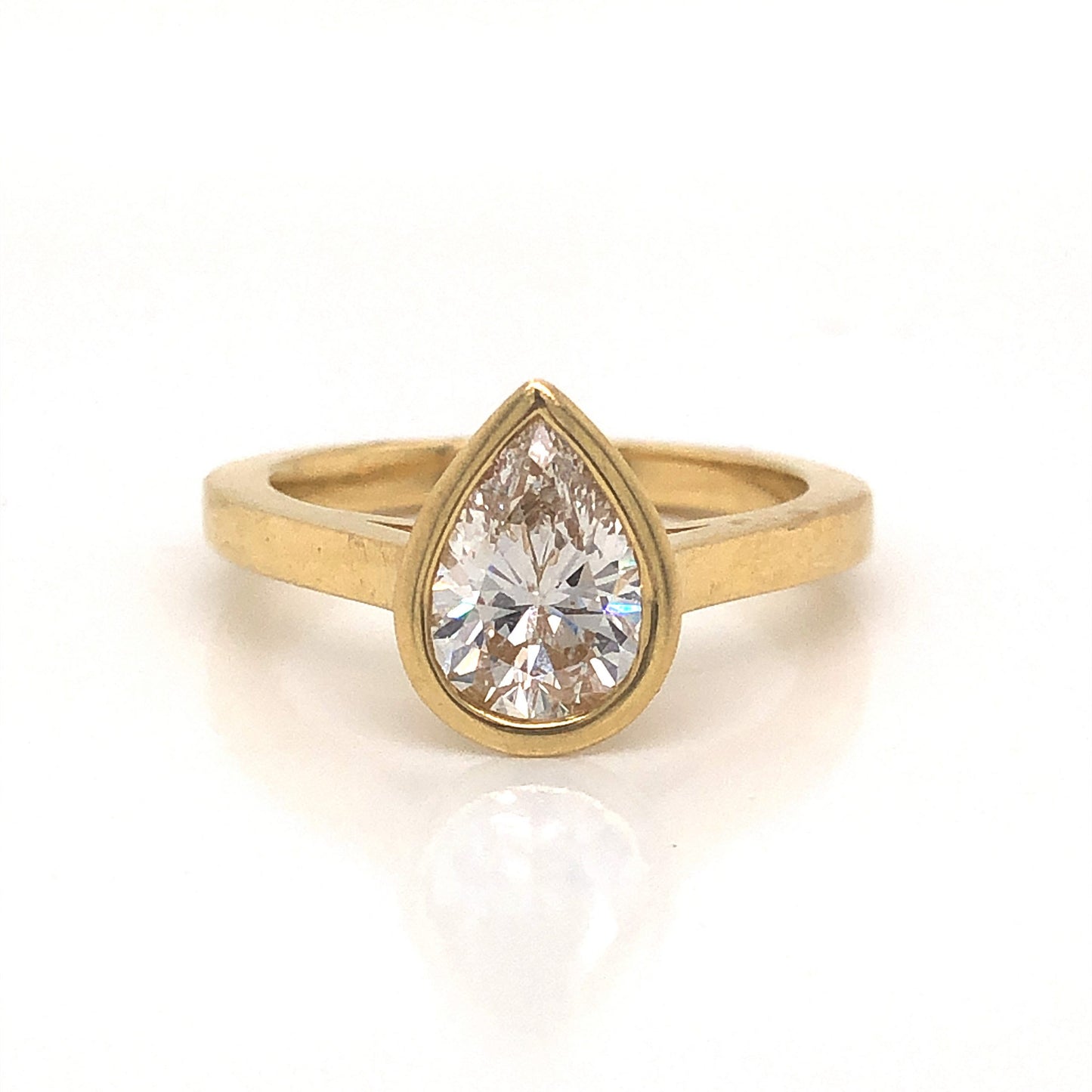 Pear Cut Bezel Set Diamond Engagement Ring in 18k Yellow Gold