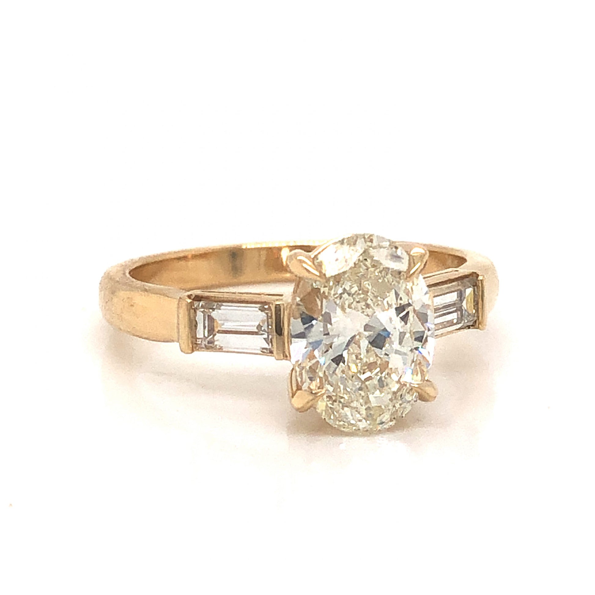 Oval Cut 1.51 Diamond Engagement Ring in 14k Yellow GoldComposition: 14 Karat Yellow GoldRing Size: 6.25Total Diamond Weight: 1.91 ctTotal Gram Weight: 3.2 gInscription: 14k