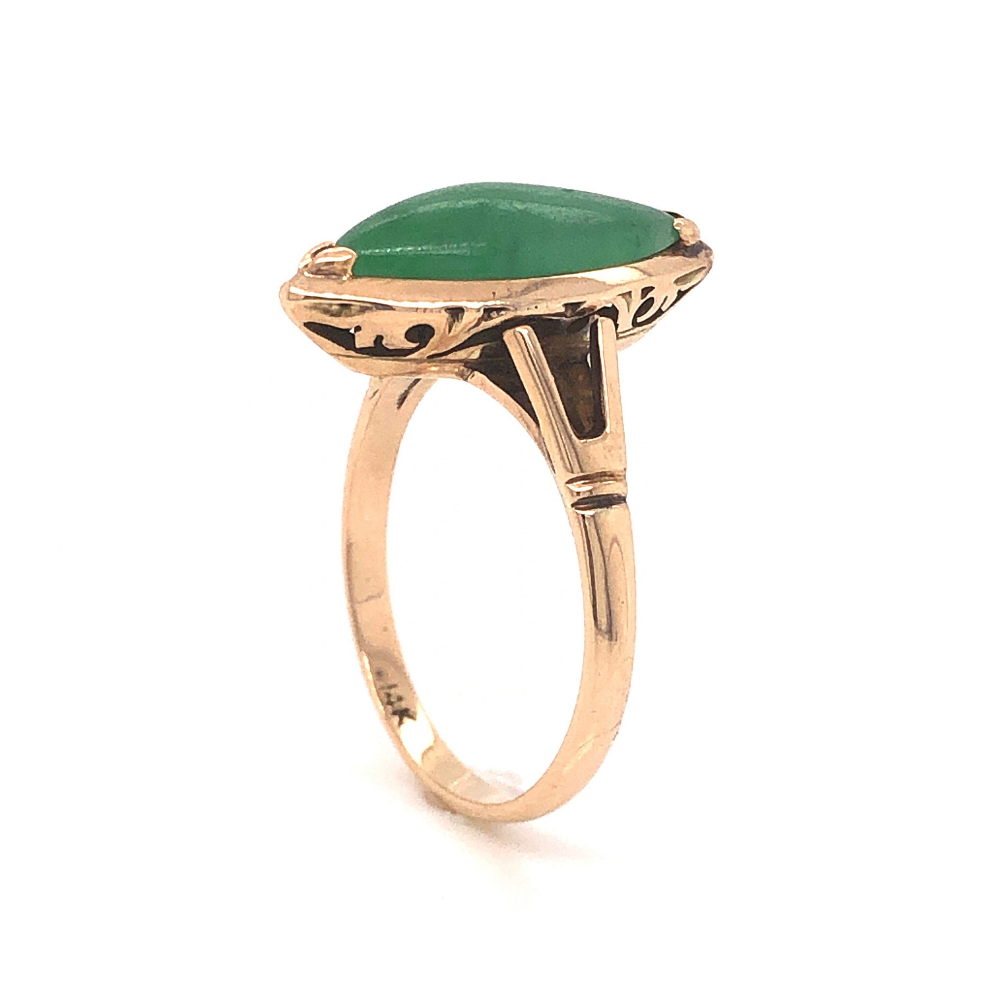 Mid-Century Marquise Shaped Jade Ring in 14k Yellow GoldComposition: 14 Karat Yellow Gold Ring Size: 7 Total Gram Weight: 3.3 g Inscription: 14k
      