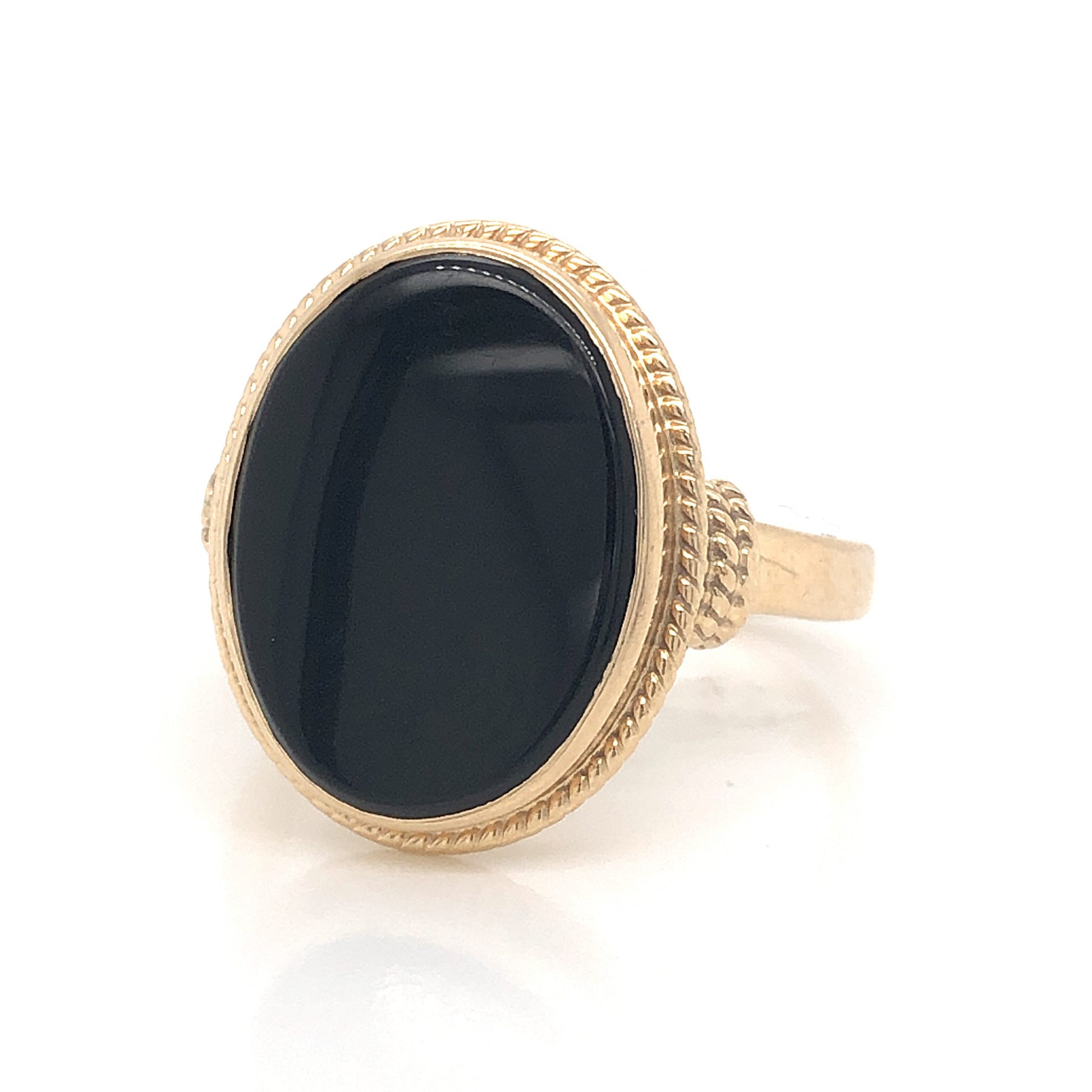 Mid-Century Onyx Cocktail Ring 14k Yellow GoldComposition: 14 Karat Yellow GoldRing Size: 7.25Total Gram Weight: 5.2 gInscription: 14k
