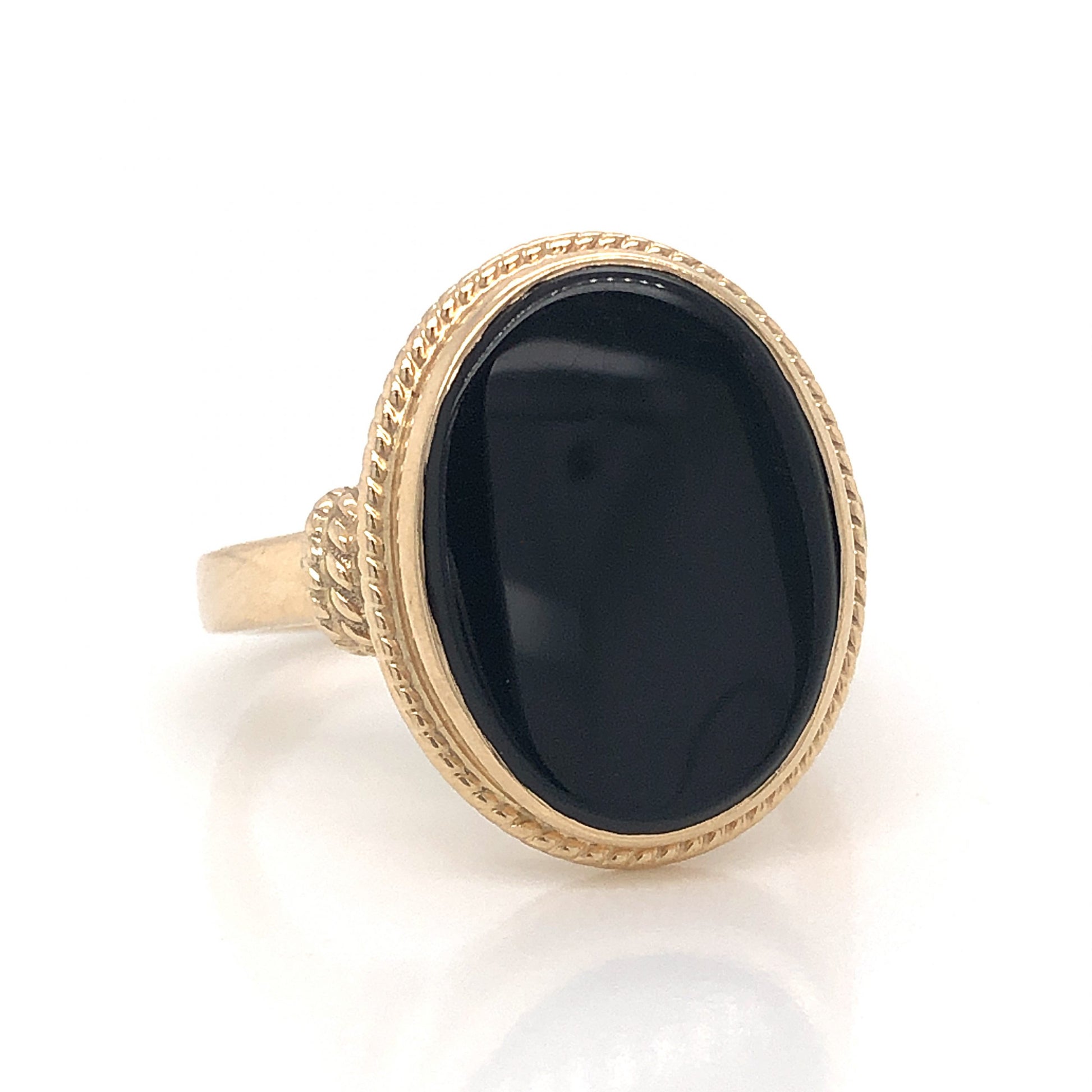 Mid-Century Onyx Cocktail Ring 14k Yellow GoldComposition: 14 Karat Yellow GoldRing Size: 7.25Total Gram Weight: 5.2 gInscription: 14k