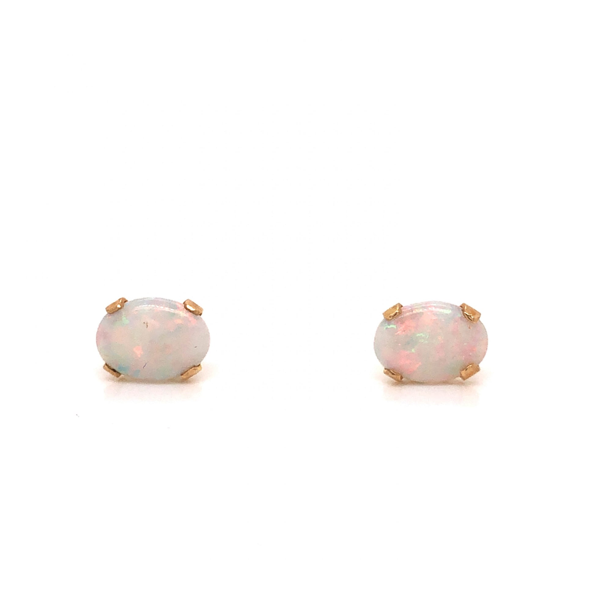 Oval Opal Stud Earrings in 14k Yellow GoldComposition: 14 Karat Yellow GoldTotal Gram Weight: .70 g