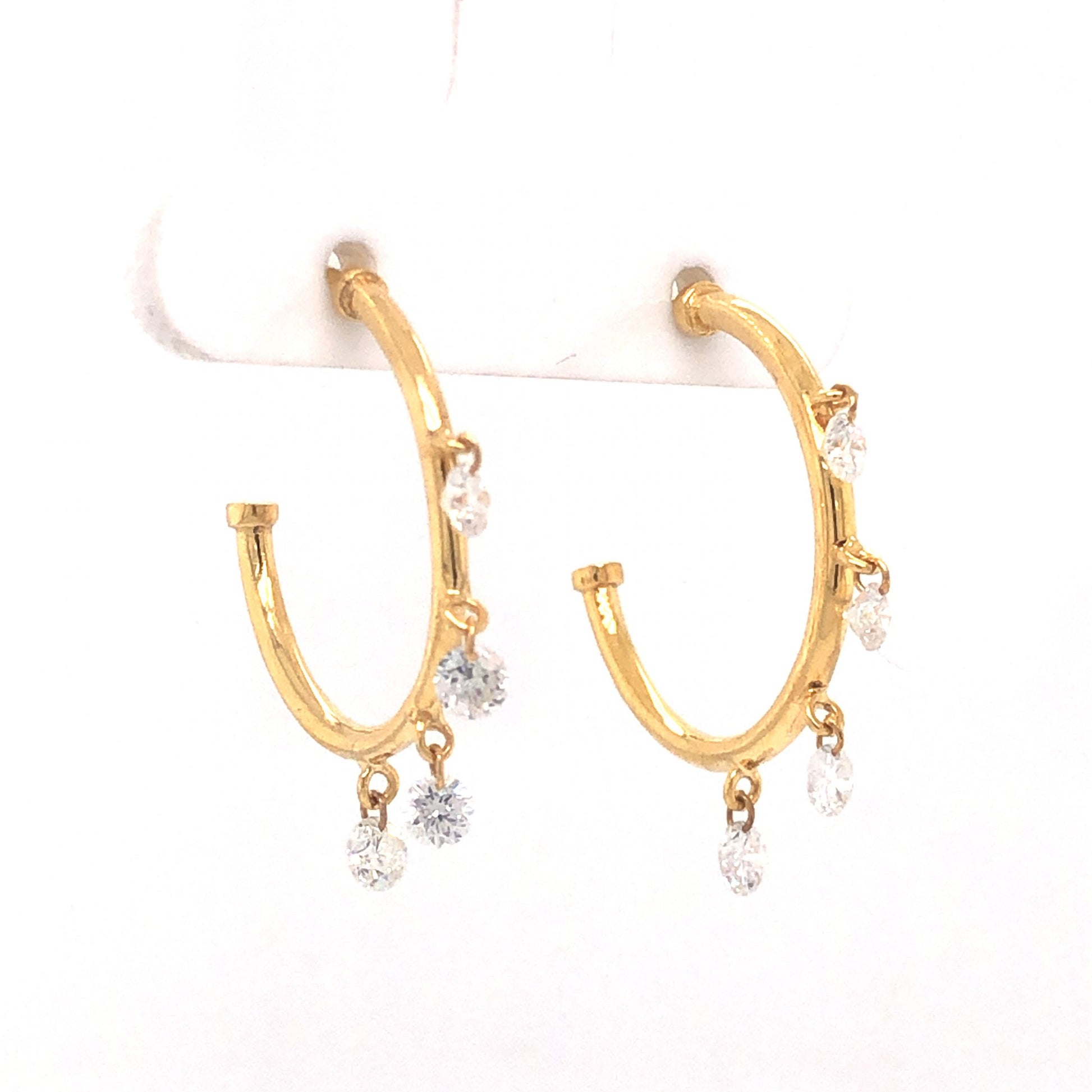 Dangle Diamond Hoop Earrings in 14k Yellow GoldComposition: 14 Karat Yellow GoldTotal Diamond Weight: .73 ctTotal Gram Weight: 3.0 gInscription: 14k