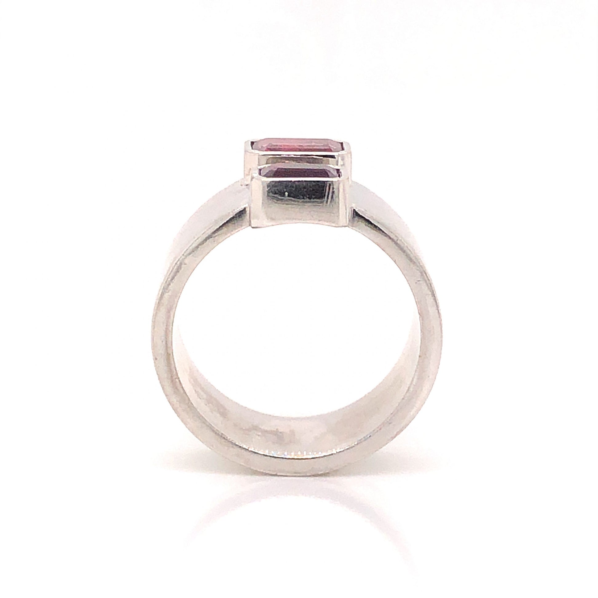 Emerald Cut Pink Tourmaline Ring in 14k White GoldComposition: 14 Karat White GoldRing Size: 8Total Gram Weight: 14.8 gInscription: 14k