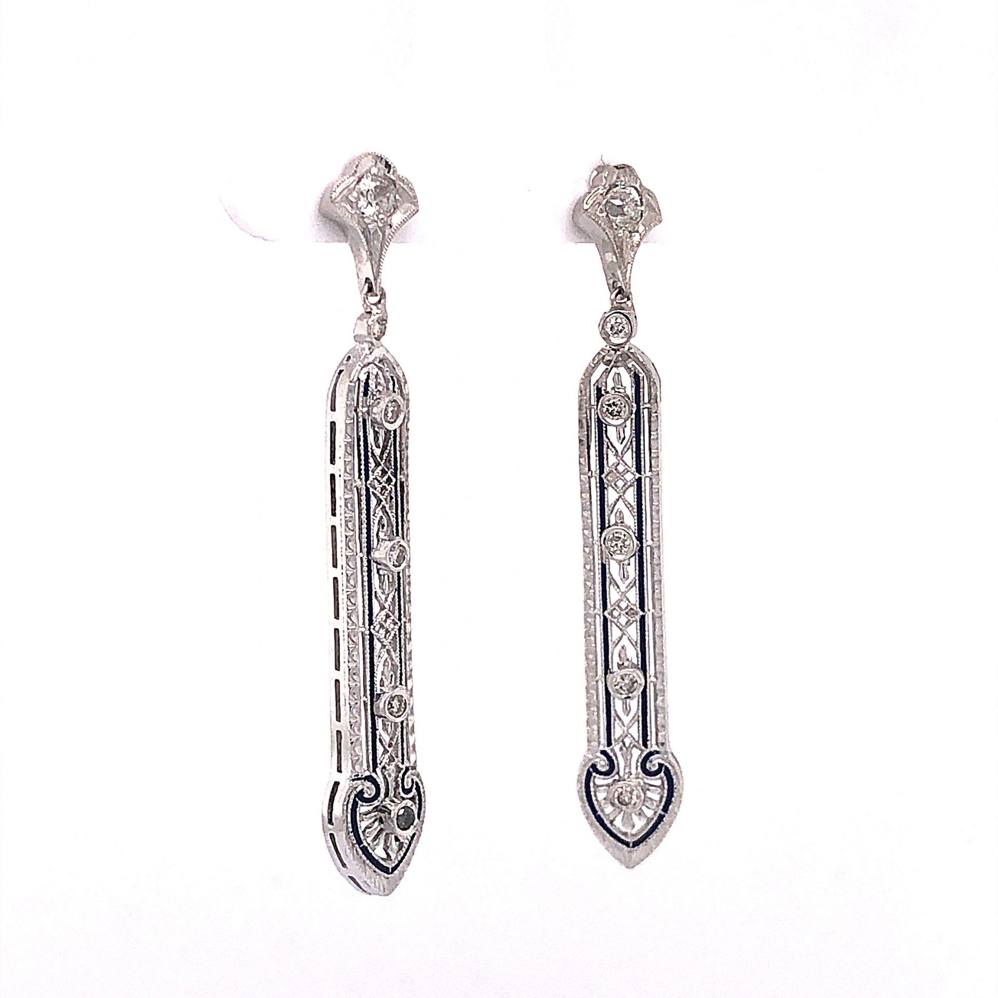 .20 Art Deco Filigree Diamond Drop Earrings in PlatinumComposition: PlatinumTotal Diamond Weight: .20 ctTotal Gram Weight: 5.2 g