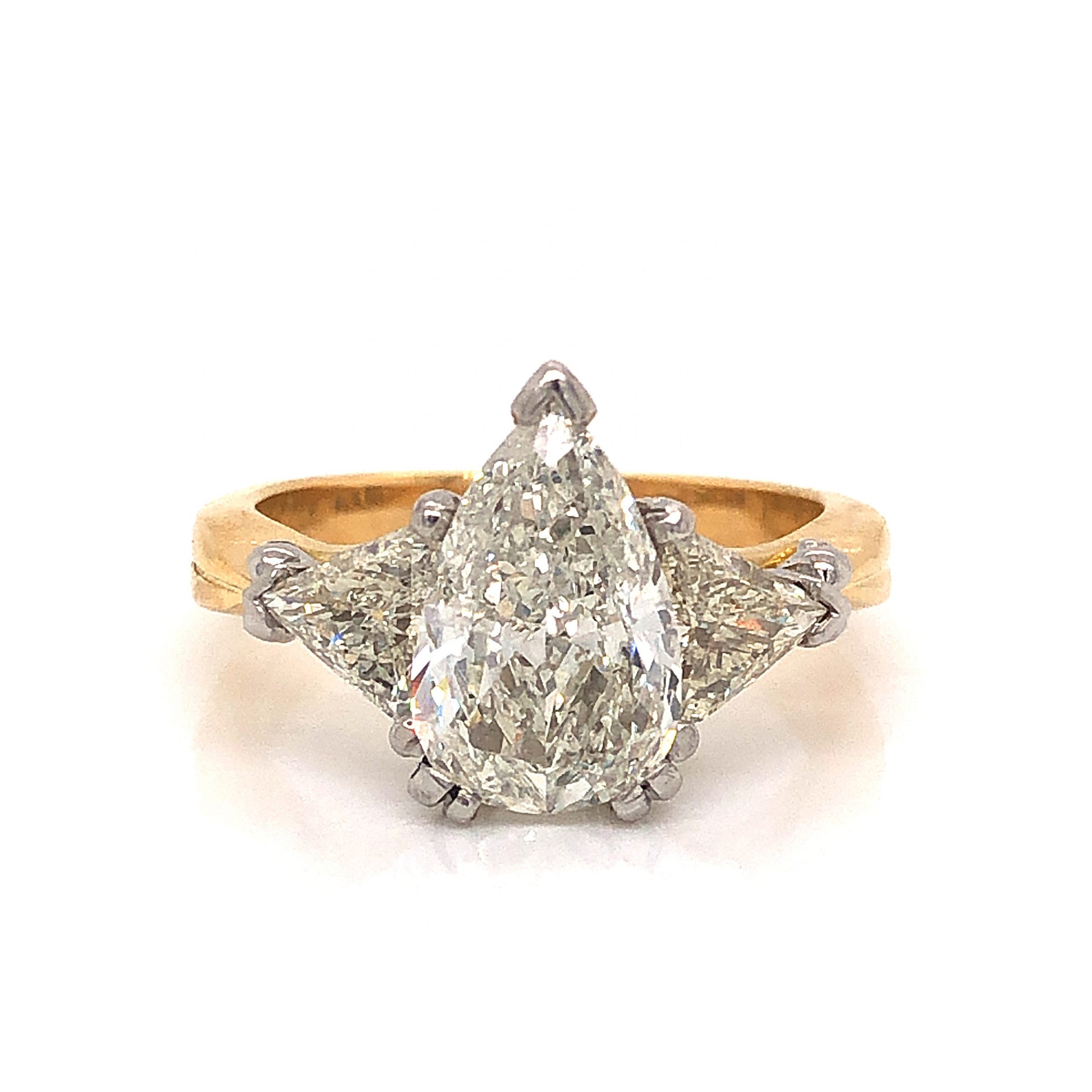 2.08 Pear Cut Diamond Engagement Ring in 18k GoldComposition: 18 Karat Yellow Gold/18 Karat White GoldRing Size: 6.75Total Diamond Weight: 3.13 ctTotal Gram Weight: 6.3 g