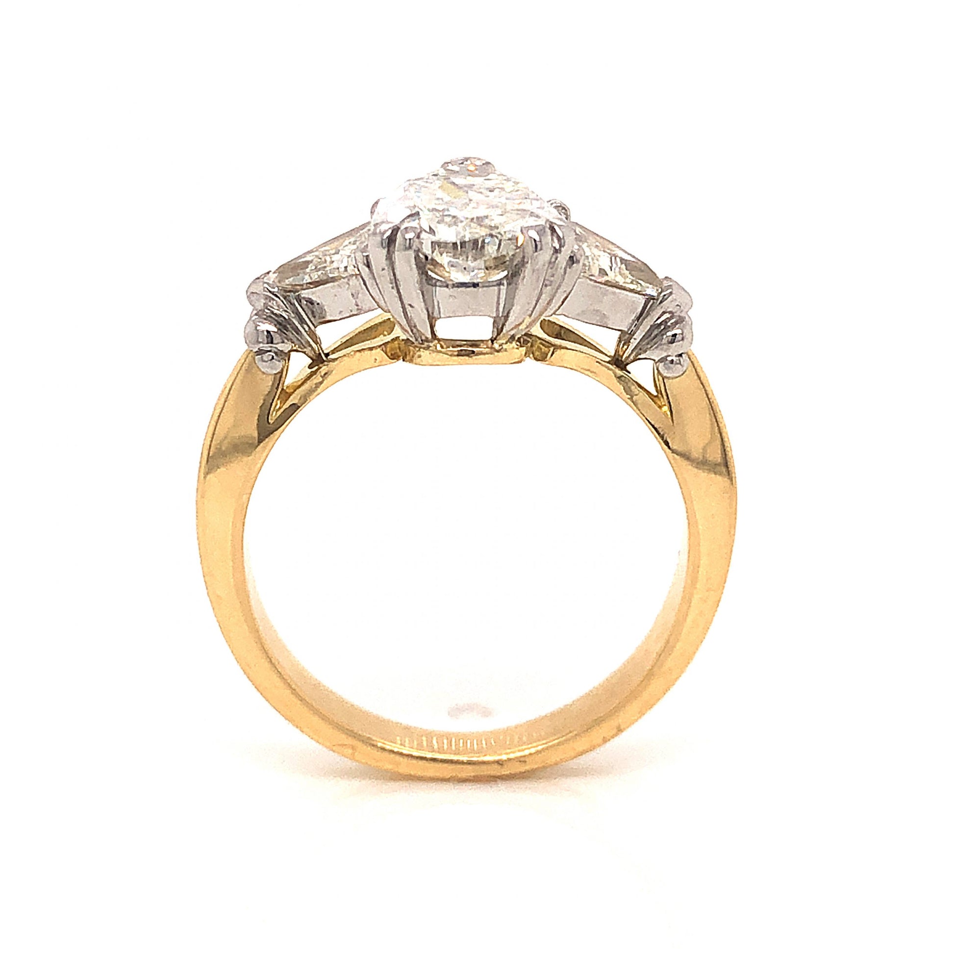 2.08 Pear Cut Diamond Engagement Ring in 18k GoldComposition: 18 Karat Yellow Gold/18 Karat White GoldRing Size: 6.75Total Diamond Weight: 3.13 ctTotal Gram Weight: 6.3 g