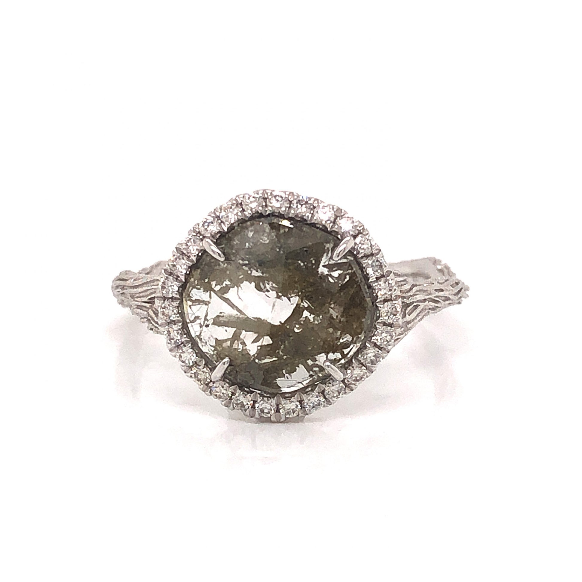 Rustic Round Diamond Halo Ring in 18k White GoldComposition: 18 Karat White GoldRing Size: 6.75Total Diamond Weight: 1.34 ctTotal Gram Weight: 2.7 gInscription: JHK 18k 750