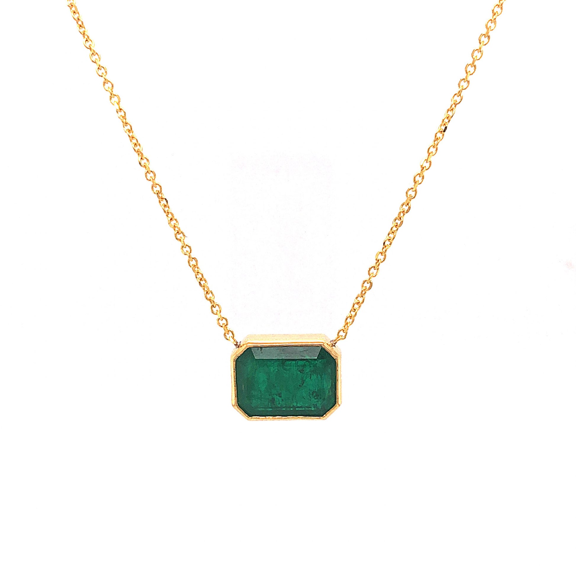 Bezel Set Emerald Pendant Necklace in 14k Yellow GoldComposition: 14 Karat Yellow GoldTotal Gram Weight: 2.75 gInscription: 14k 3.85 ct