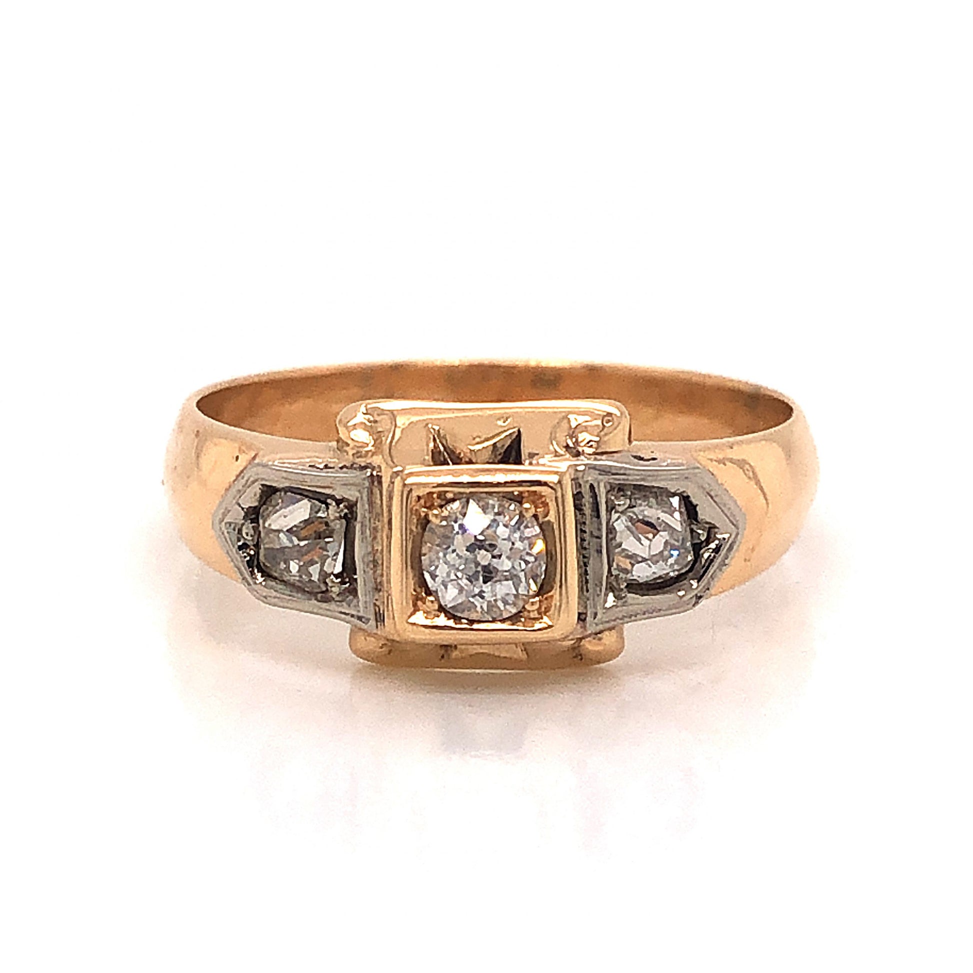 Retro Three Stone Diamond Engagement Ring 14k GoldComposition: 14 Karat Yellow Gold/14 Karat White Gold Ring Size: 8.5 Total Diamond Weight: .43ct Total Gram Weight: 4.43 g