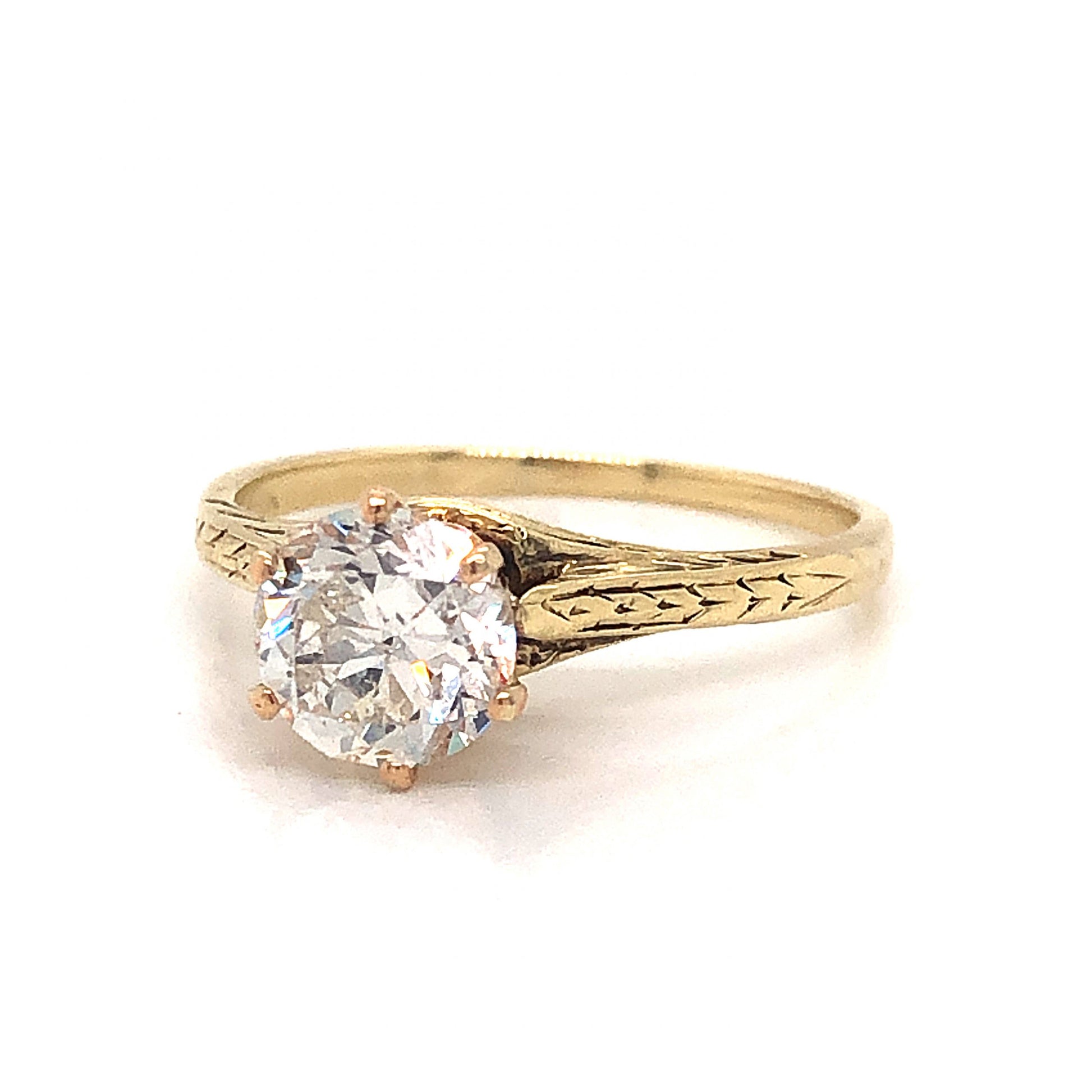 Victorian Engraved Solitaire Diamond Engagement Ring in 14kComposition: 14 Karat Yellow Gold/14 Karat Rose Gold Ring Size: 5.5 Total Diamond Weight: 1.02ct Total Gram Weight: 2.1 g