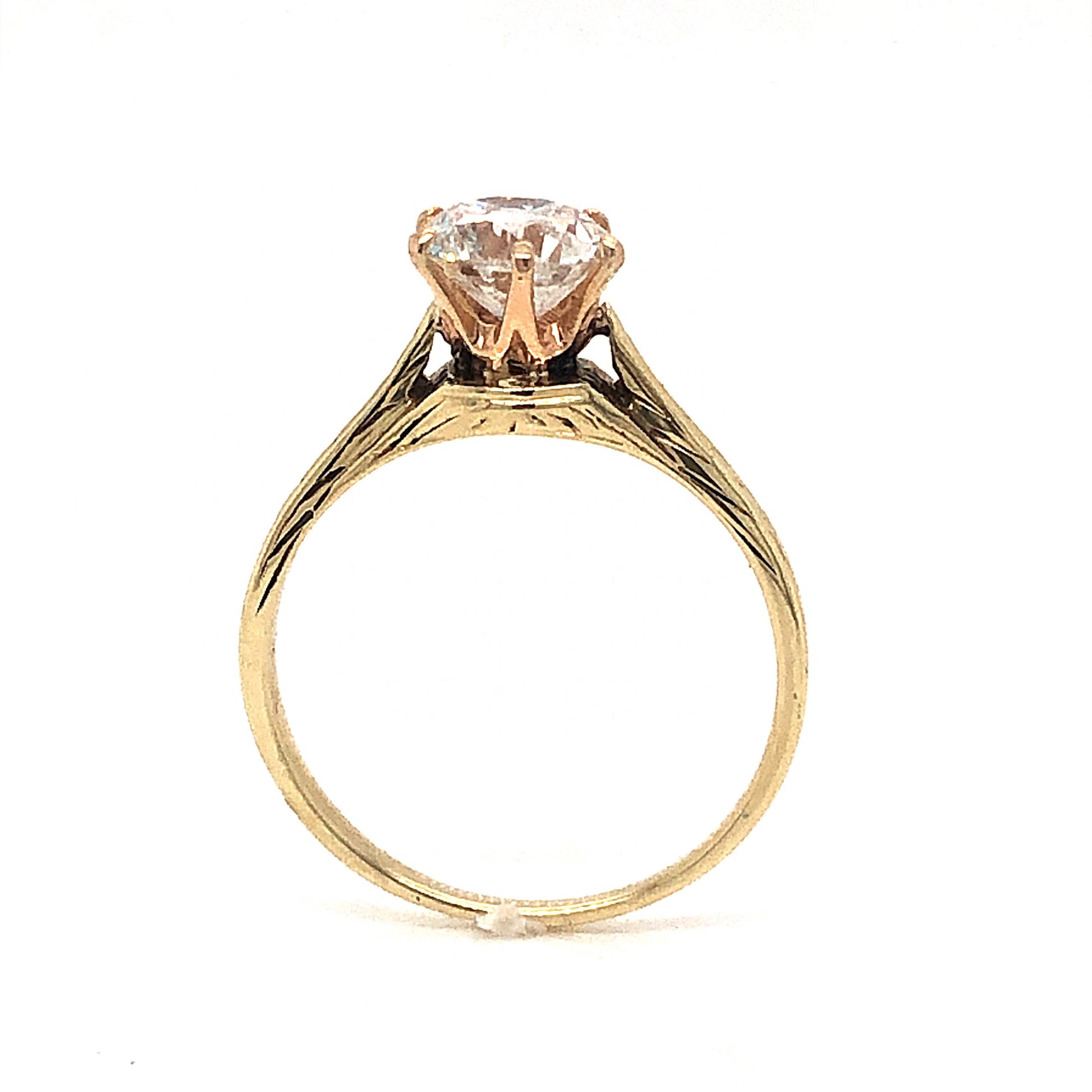Victorian Engraved Solitaire Diamond Engagement Ring in 14kComposition: 14 Karat Yellow Gold/14 Karat Rose Gold Ring Size: 5.5 Total Diamond Weight: 1.02ct Total Gram Weight: 2.1 g