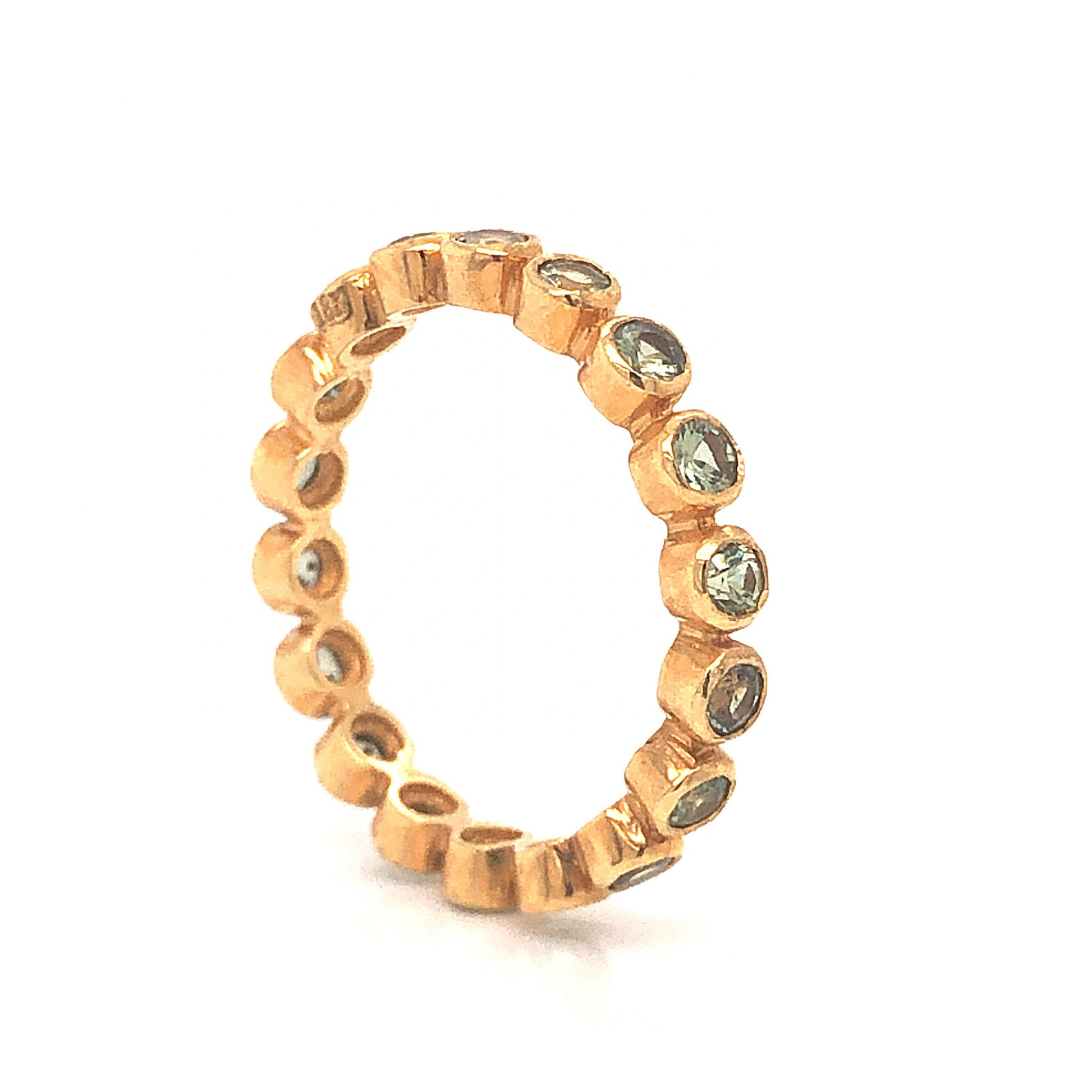 Bezel Set Green Sapphire Eternity Band in 18k Yellow Gold