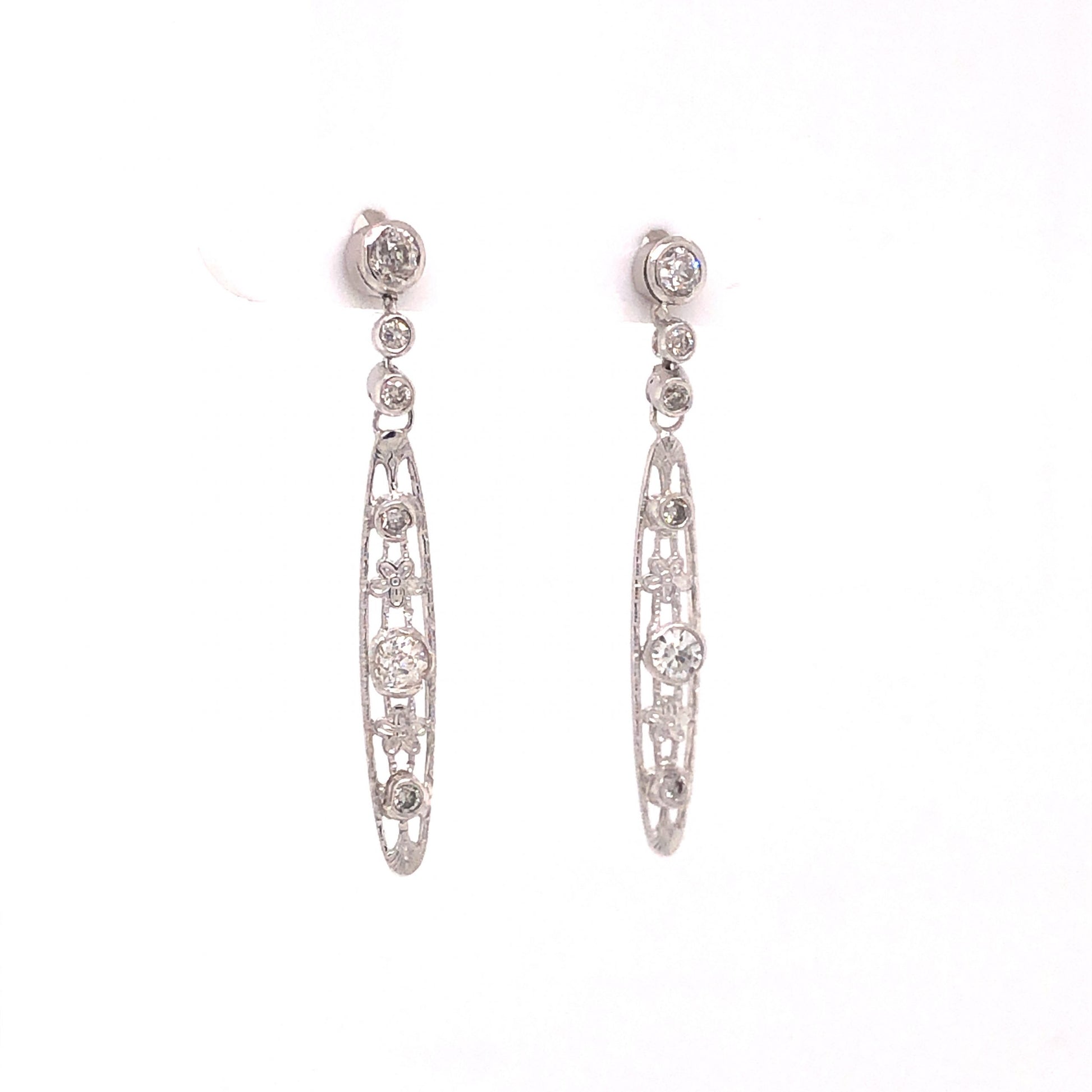 .60 Art Deco Filigree Diamond Drop Earrings in PlatinumComposition: Platinum Total Diamond Weight: .60ct Total Gram Weight: 2.3 g