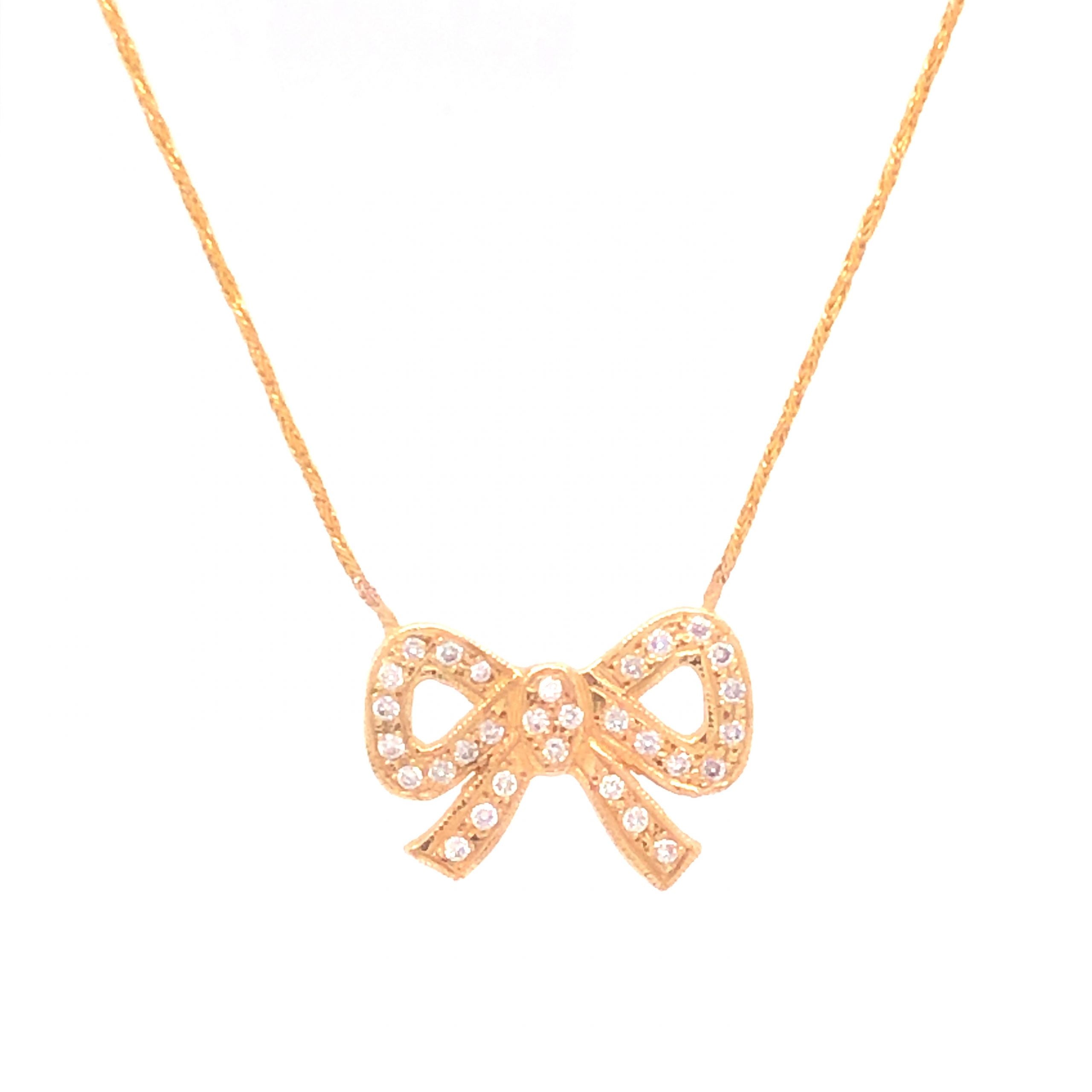 Diamond Bow Pendant Necklace in 10K Yellow Gold - Filigree Jewelers