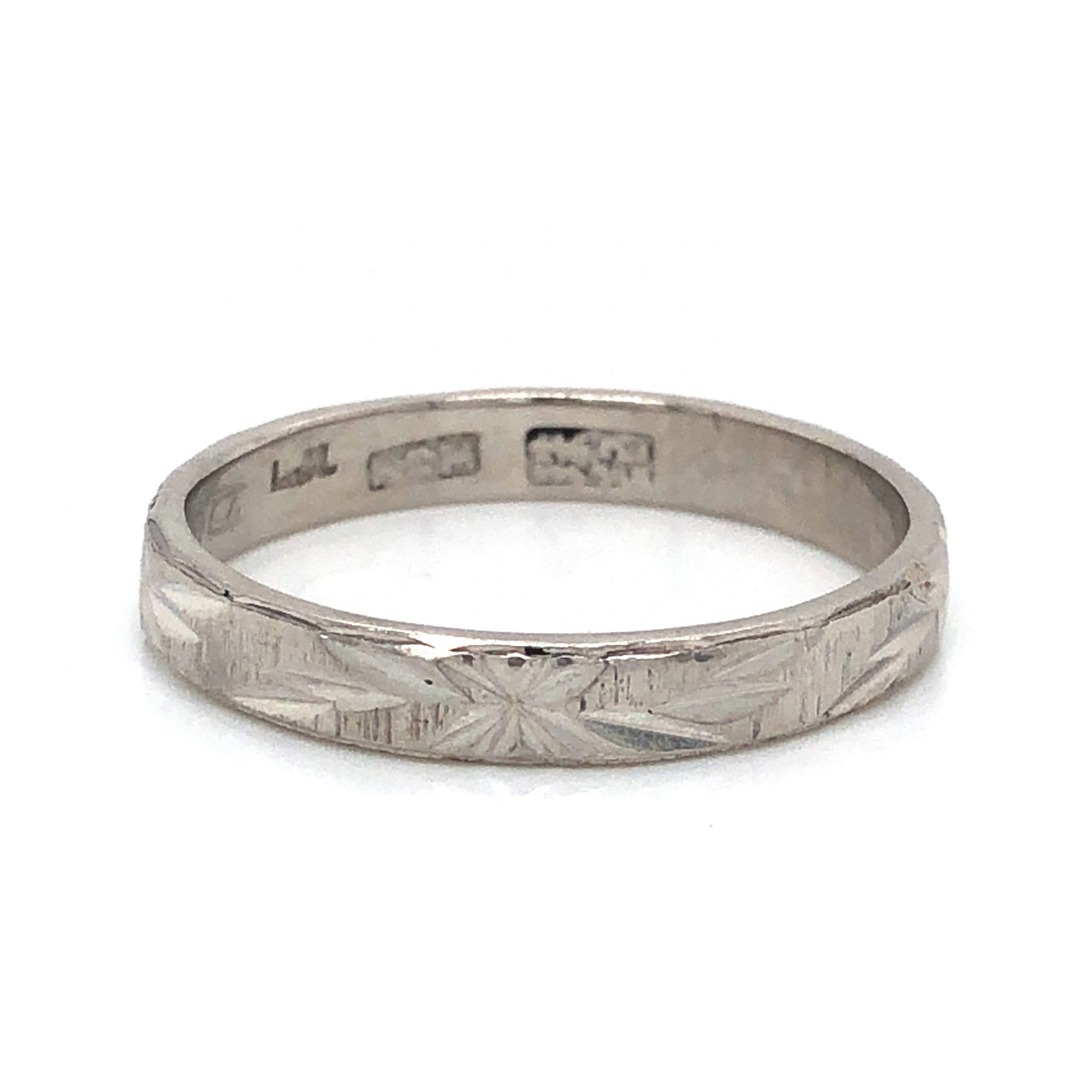 Art Deco Hand Engraved Wedding Band in PlatinumComposition: Platinum Ring Size: 7.5 Total Gram Weight: 3.5 g Inscription: L.H. Dorothy Lo
      