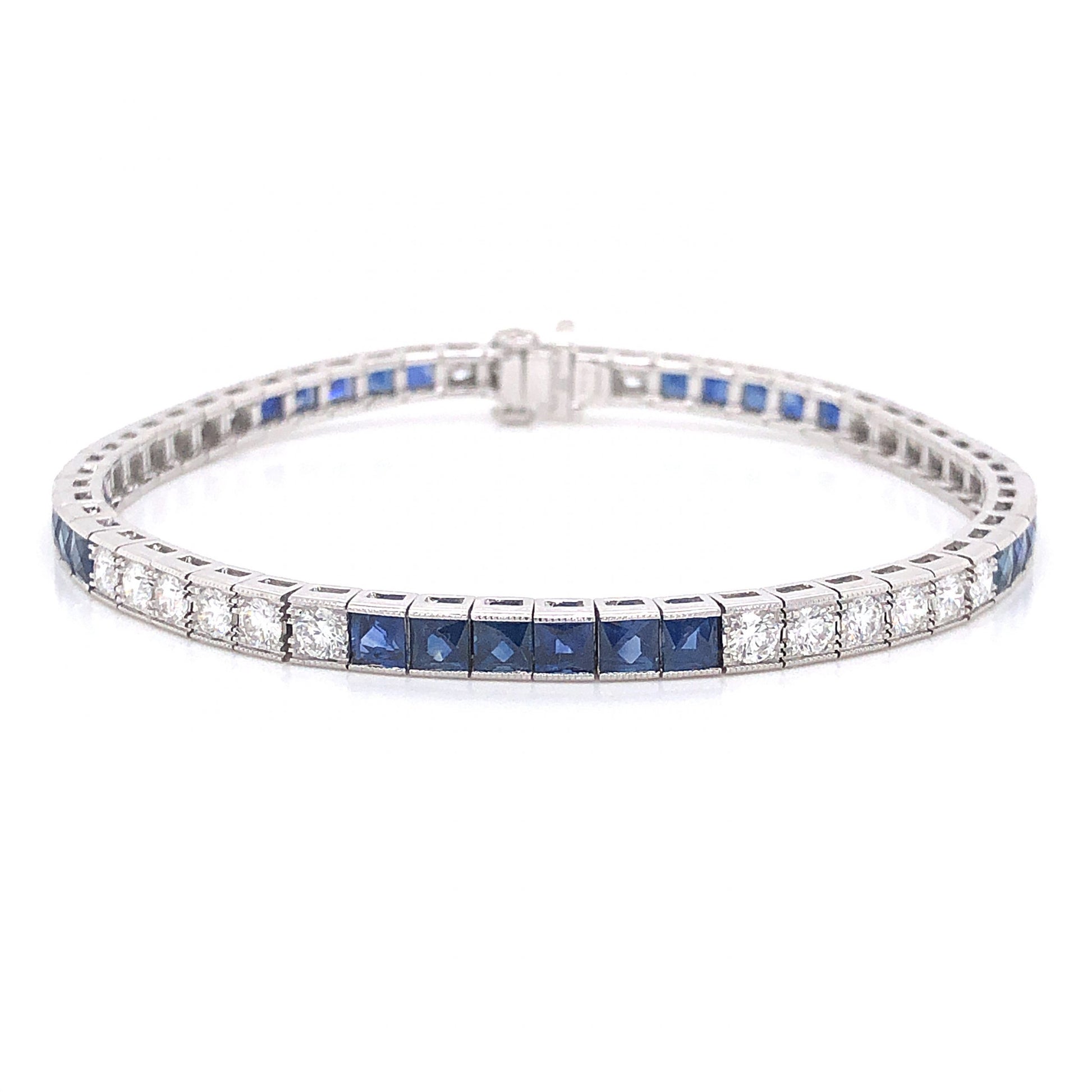 French Cut Sapphire & Round Diamond Bracelet in PlatinumComposition: PlatinumTotal Diamond Weight: 2.47 ctTotal Gram Weight: 17.8 gInscription: PLAT SOPHIA D.