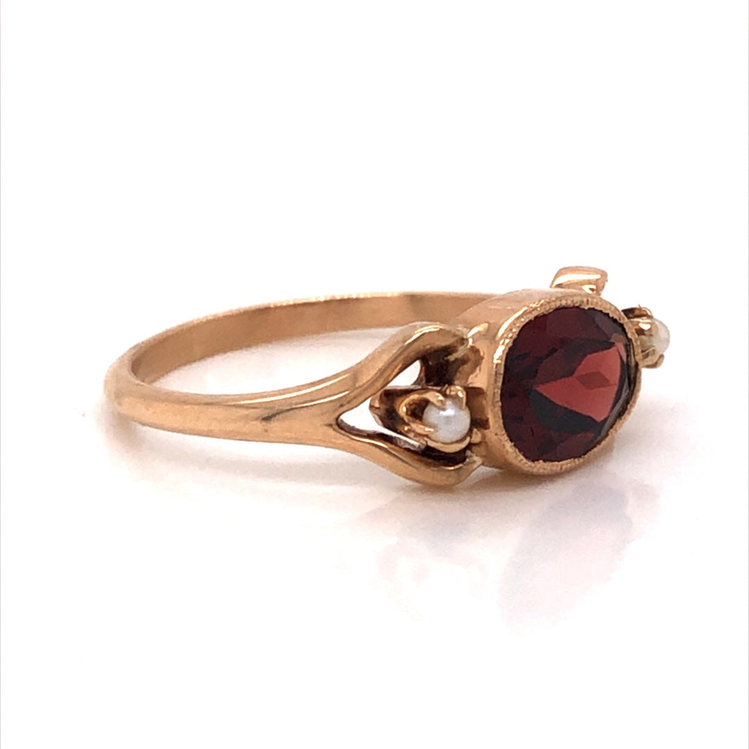 Victorian Garnet & Pearl Ring in 10k Yellow GoldComposition: 10 Karat Yellow Gold Ring Size: 6 Total Gram Weight: 2.1 g