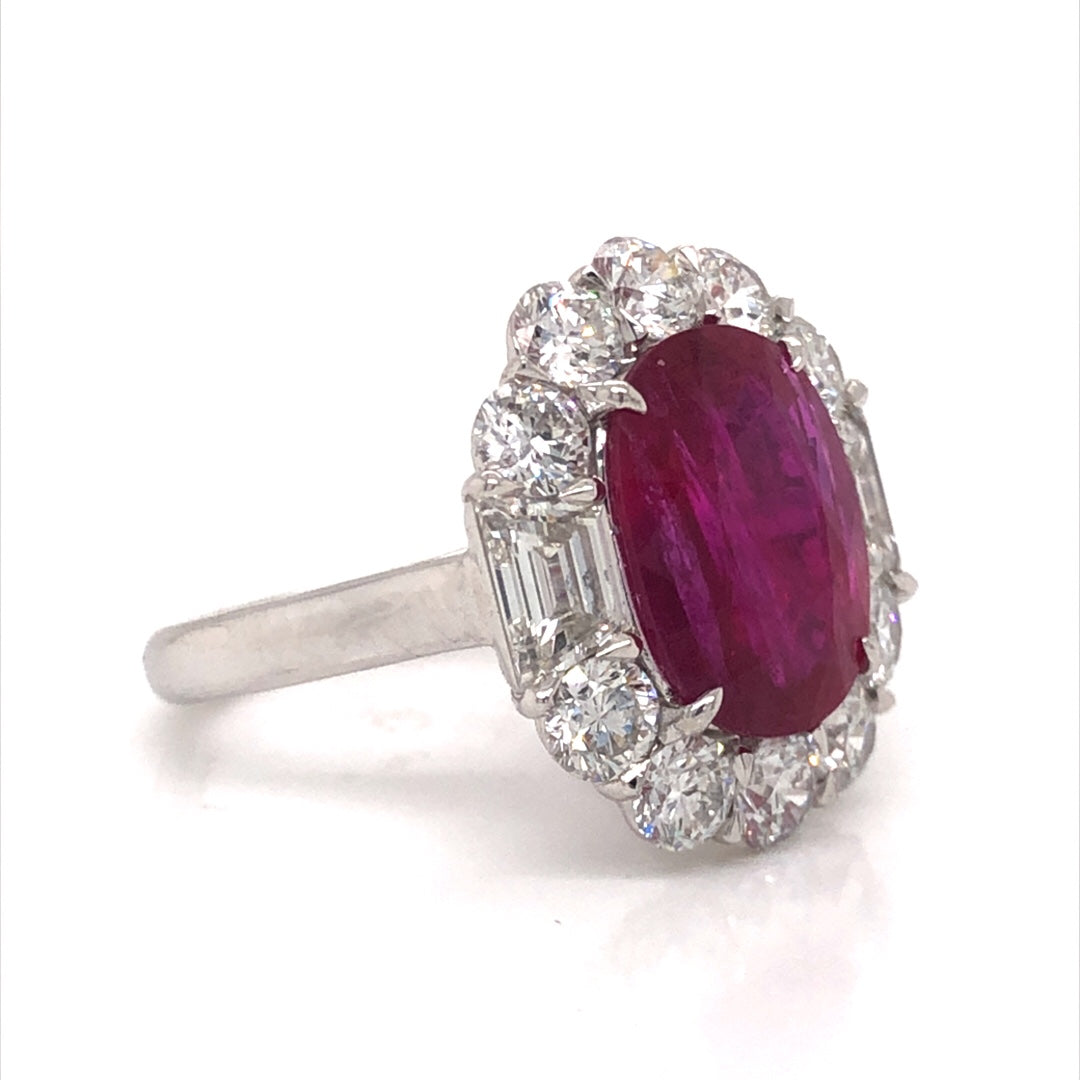 Cushion Cut Ruby & Diamond Cocktail Ring in PlatinumComposition: PlatinumRing Size: 6.25Total Diamond Weight: 2.65 ctTotal Gram Weight: 9.04 gInscription: PLAT SOPHIA D. 3855C R 4.77 D 0.83 1.82