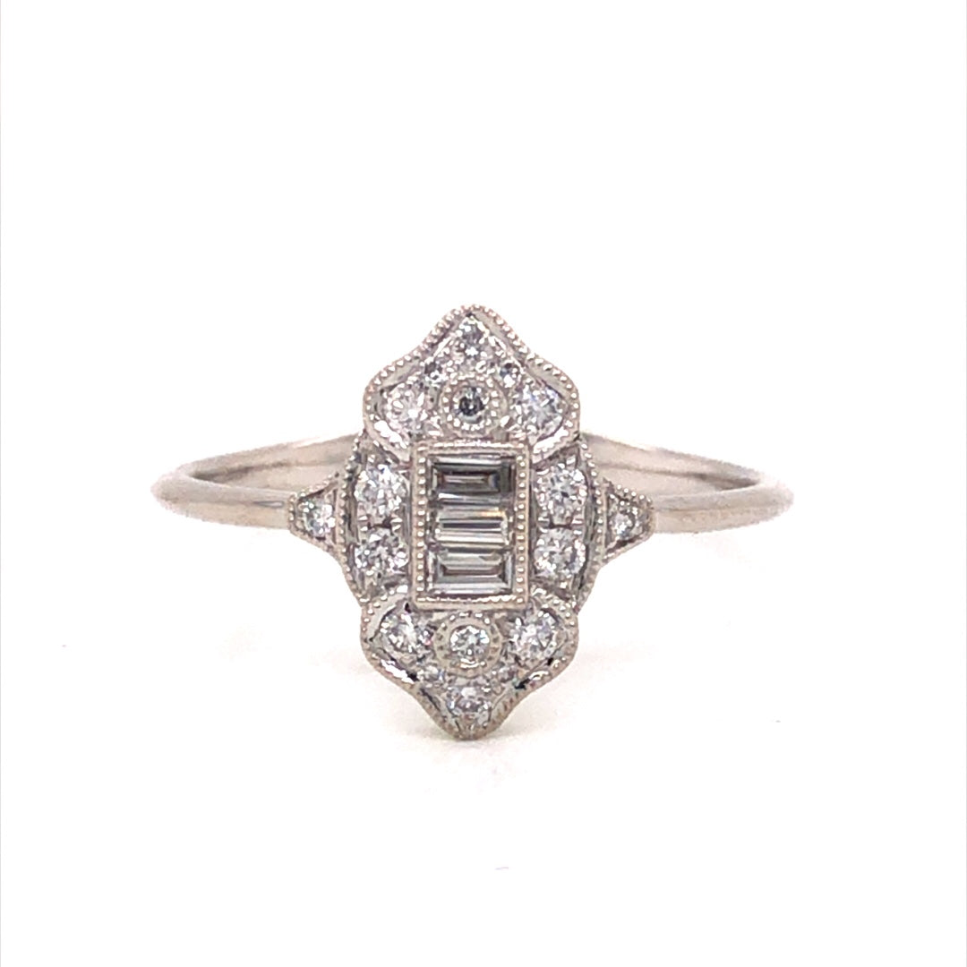 Antique Inspired Diamond Cluster Ring in 18k White GoldComposition: 18 Karat White GoldRing Size: 6.5Total Diamond Weight: .26 ctTotal Gram Weight: 2.4 gInscription: JHK 18k 750