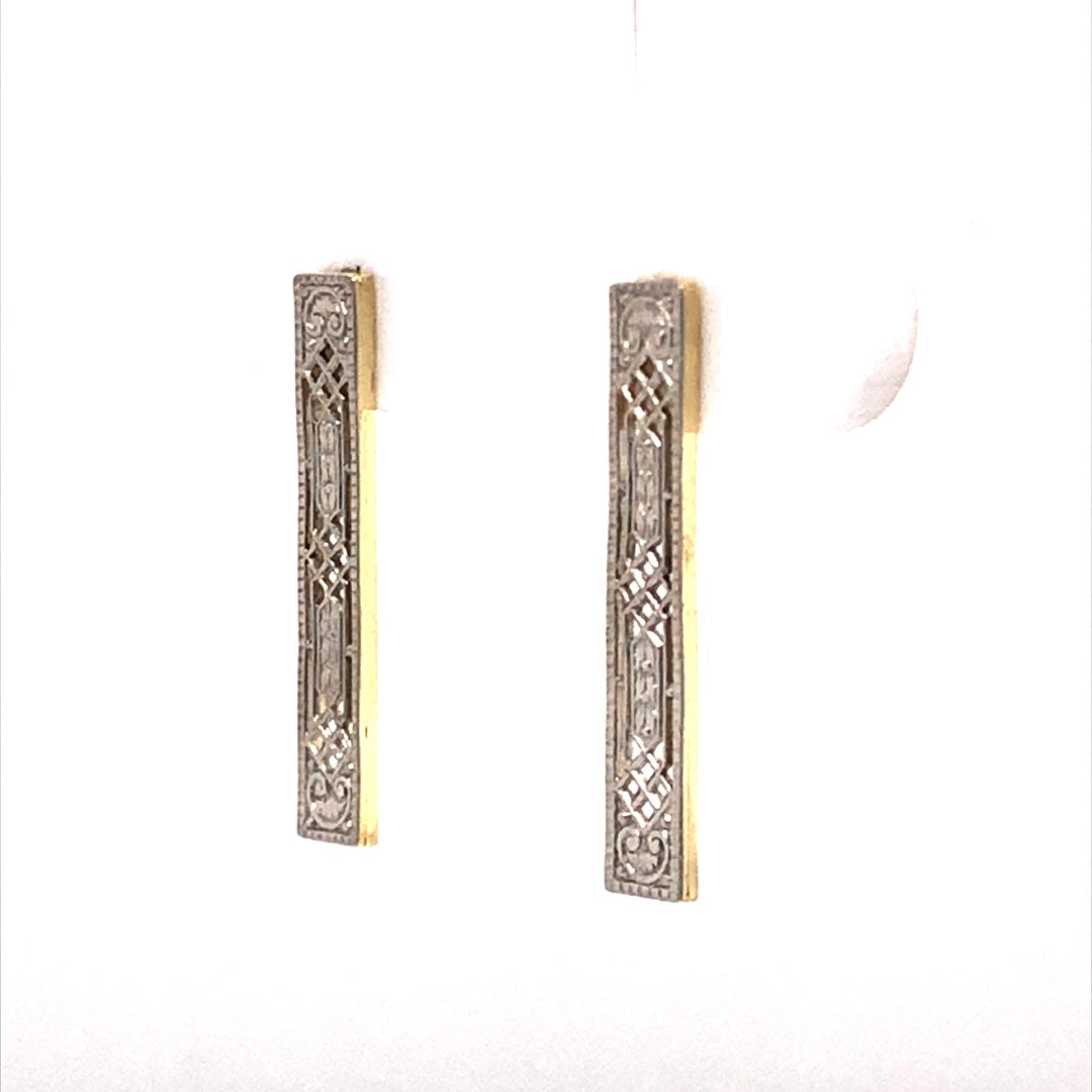 Two-Tone Filigree Drop Earrings in 14k GoldComposition: 14 Karat White Gold/14 Karat Yellow GoldTotal Gram Weight: 1.1 g
