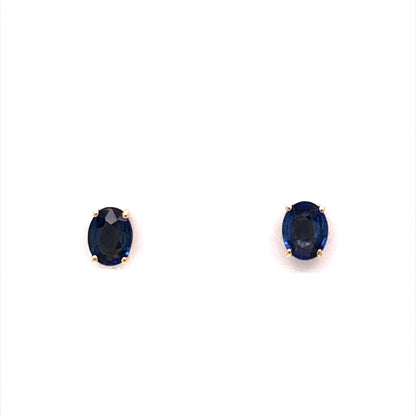 Oval Cut Sapphire Stud Earrings in 14k Yellow Gold