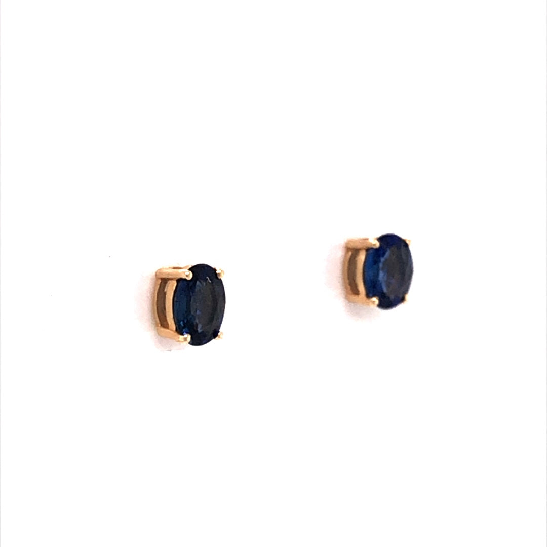 Oval Cut Sapphire Stud Earrings in 14k Yellow Gold