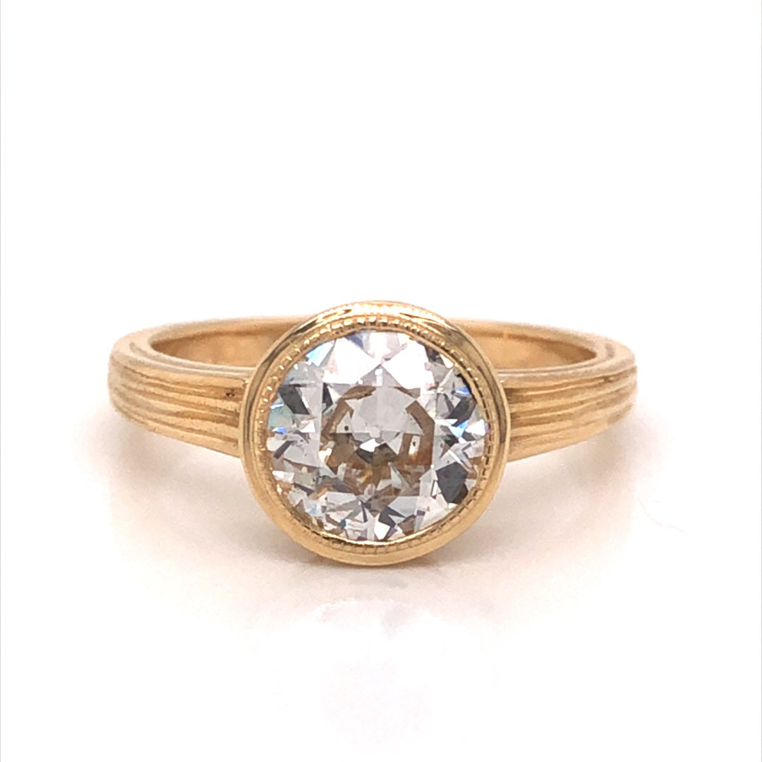 1.33 Bezel Set Diamond Engagement Ring in 14k Yellow GoldComposition: 14 Karat Yellow Gold Ring Size: 6.25 Total Diamond Weight: 1.33ct Total Gram Weight: 4.2 g Inscription: 14k
      