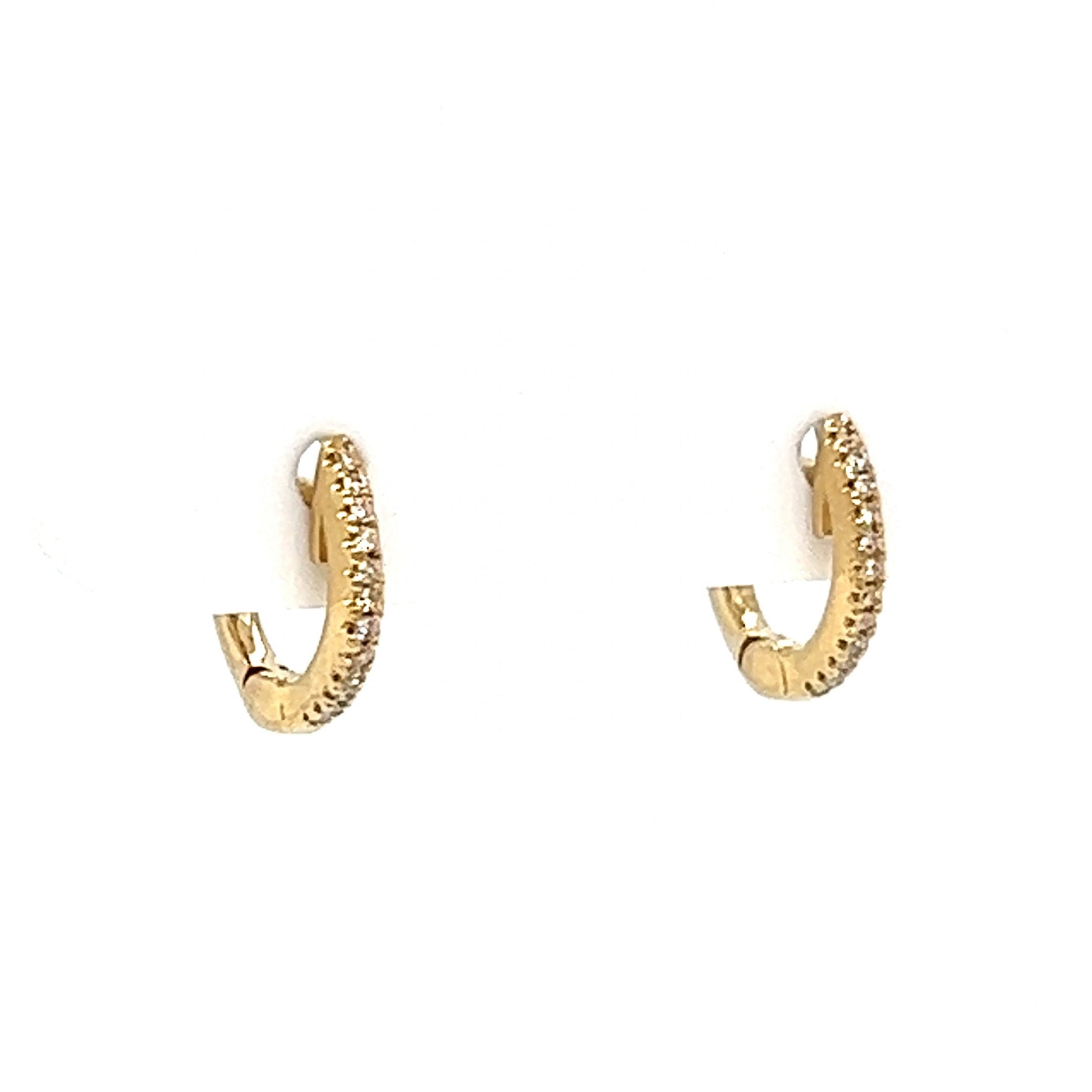 Diamond Huggie Hoop Earrings in 14k Yellow GoldComposition: 14 Karat Yellow Gold Total Diamond Weight: .04ct Total Gram Weight: 1.1 g Inscription: 14k
      