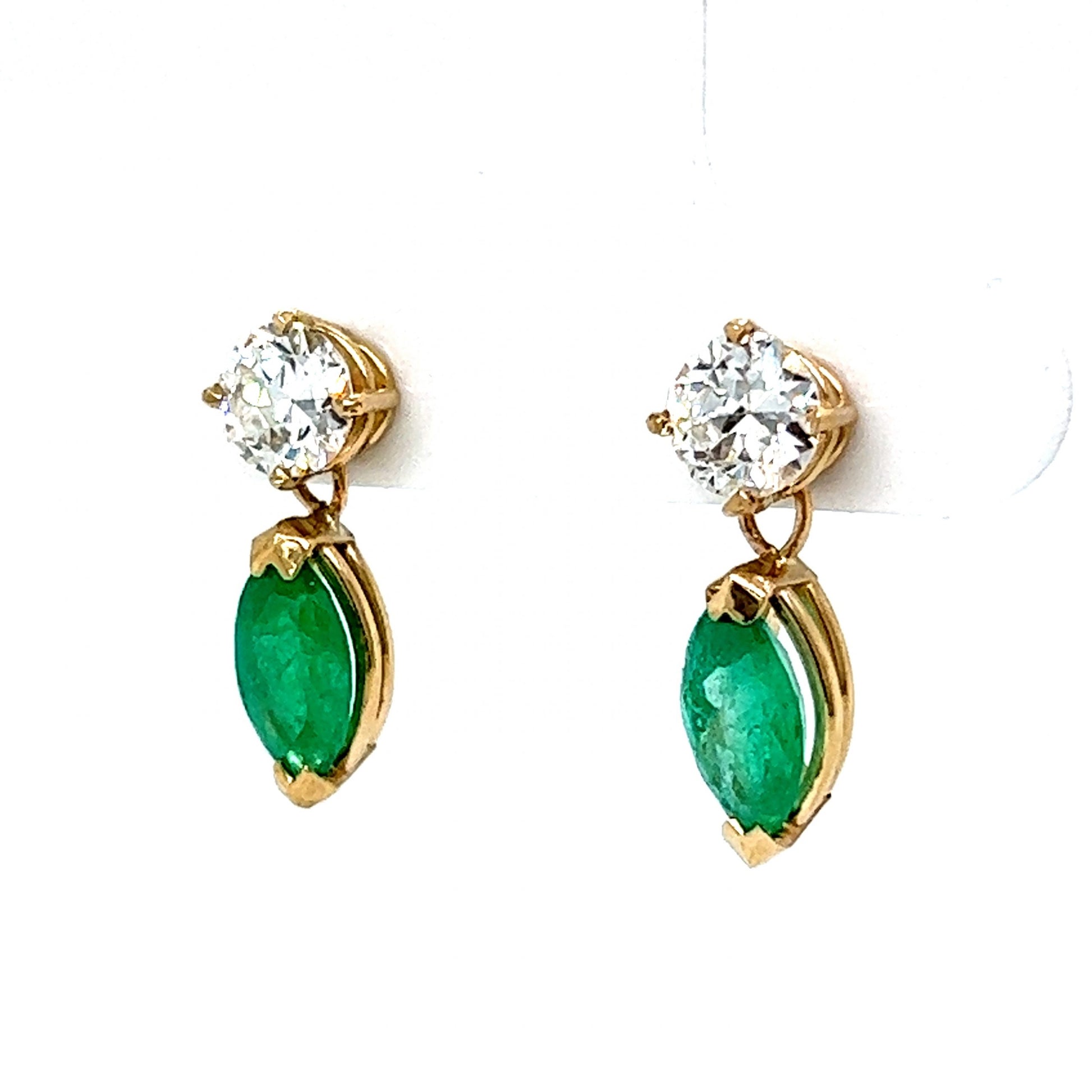 Diamond & Marquise Cut Emerald Earrings in 14k Yellow GoldComposition: 14 Karat Yellow GoldTotal Diamond Weight: 1.08 ctTotal Gram Weight: 2.0 gInscription: 14k