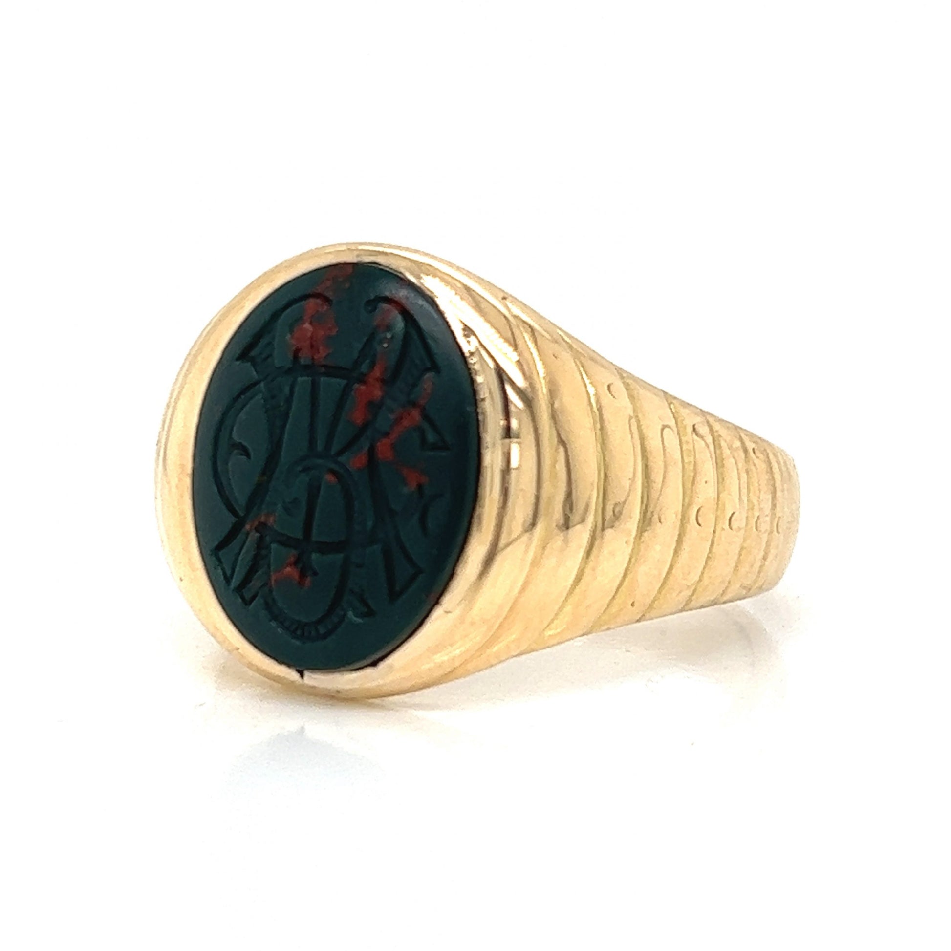 Vintage Men's Carved Bloodstone Ring in 14k Yellow GoldComposition: 14 Karat Yellow GoldRing Size: 10Total Gram Weight: 12.9 gInscription: 14k