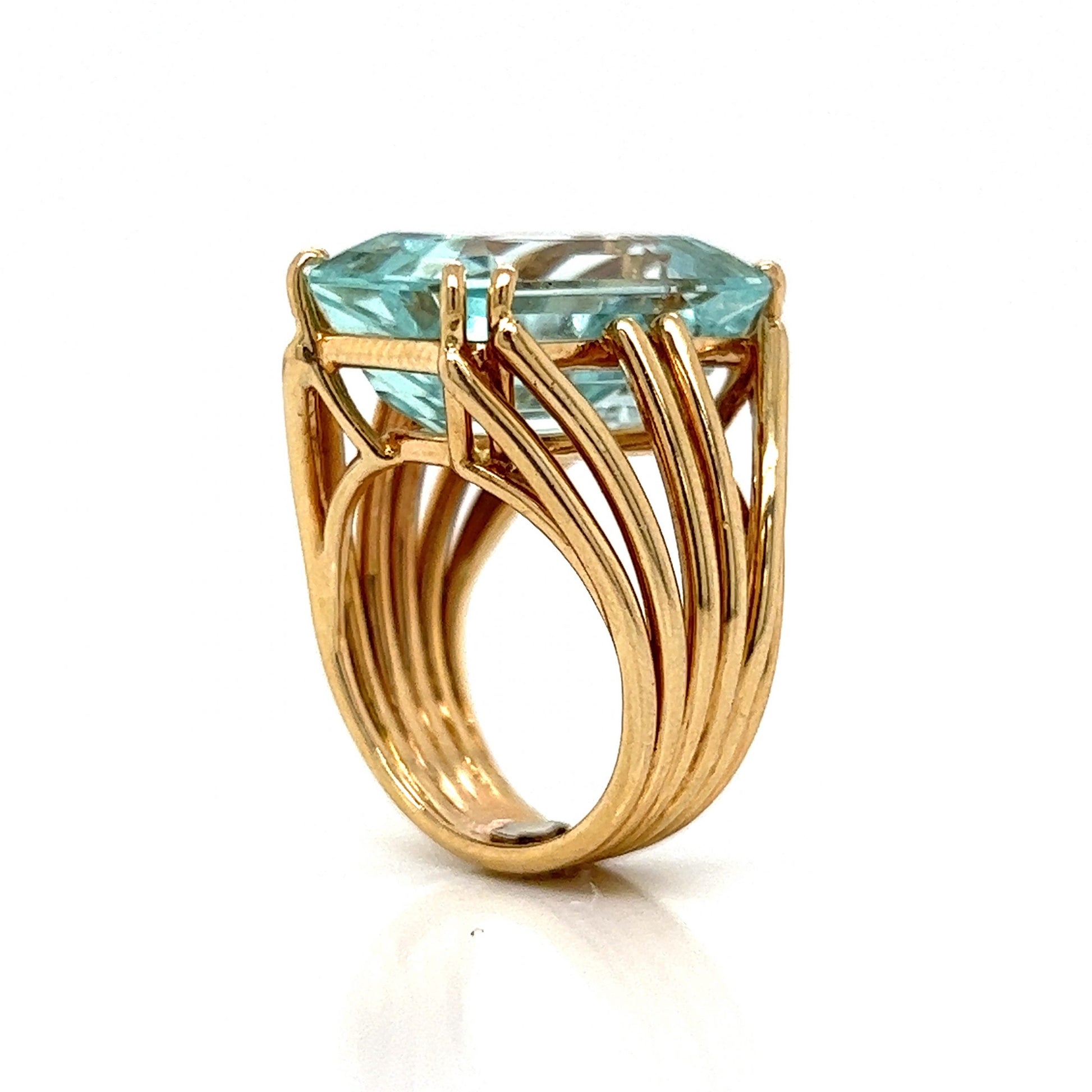 Mid-Century Aquamarine Cocktail Ring in 14k Yellow GoldComposition: 14 Karat Yellow GoldRing Size: 5Total Gram Weight: 12.0 gInscription: 14K