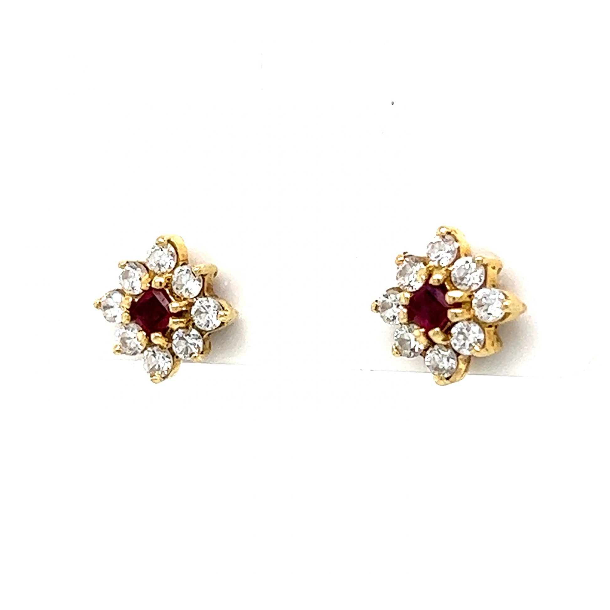 Diamond & Ruby Cluster Stud Earrings in 14k Yellow GoldComposition: 14 Karat Yellow GoldTotal Diamond Weight: .32 ctTotal Gram Weight: 1.0 gInscription: 14k