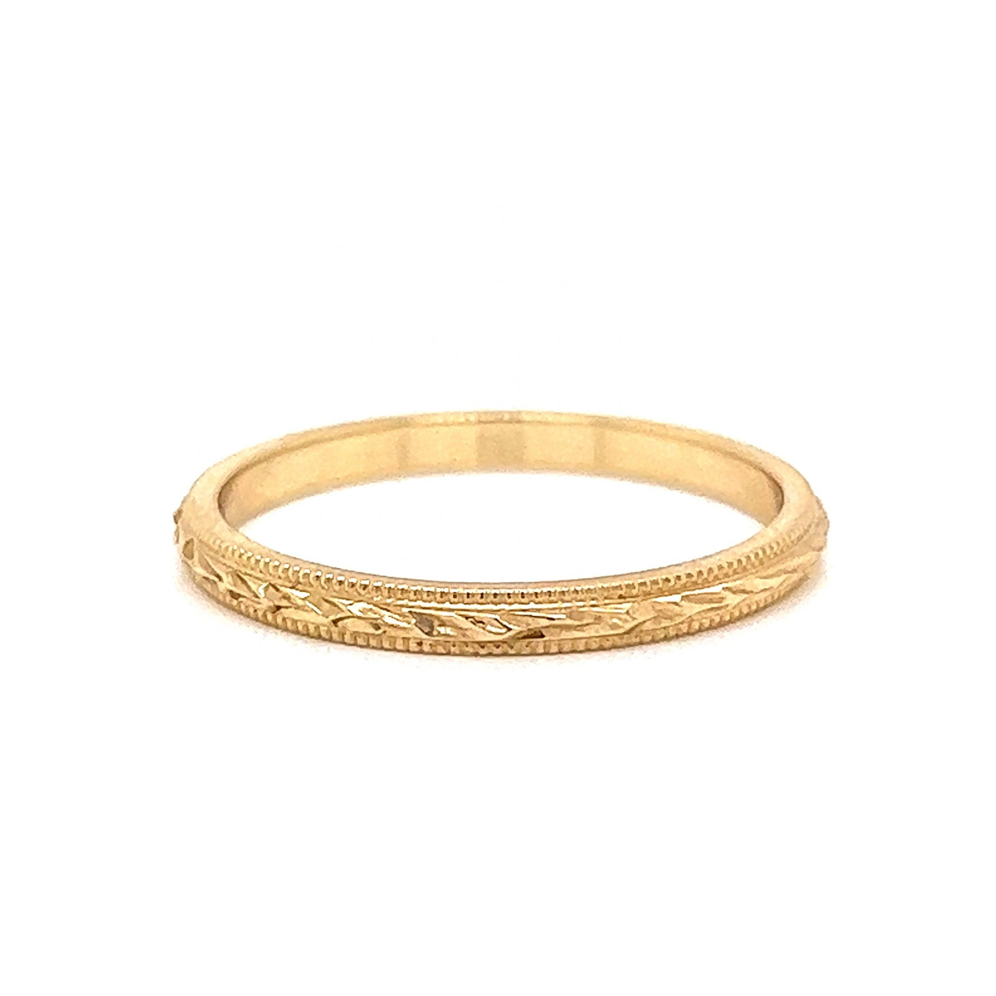 Antique Inspired Engraved Wedding Band in 14k Yellow GoldComposition: 14 Karat Yellow GoldRing Size: 7Total Gram Weight: 1.7 gInscription: 14k B&N