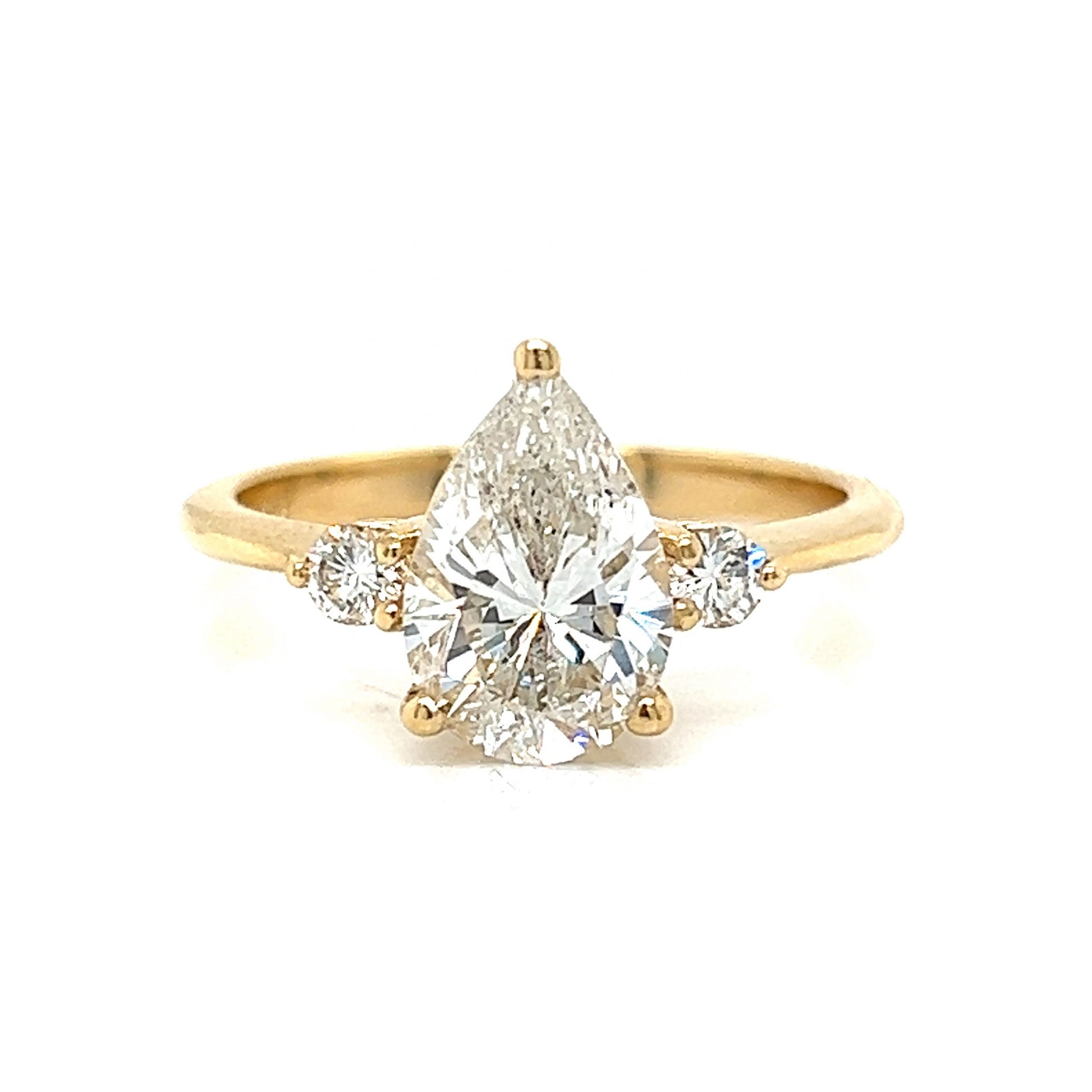Pear Cut Diamond Engagement Ring in 14k Yellow Gold