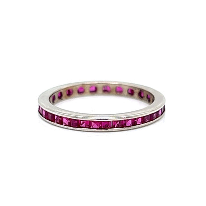 2mm Channel Set Ruby Eternity Wedding Band in 14k White Gold