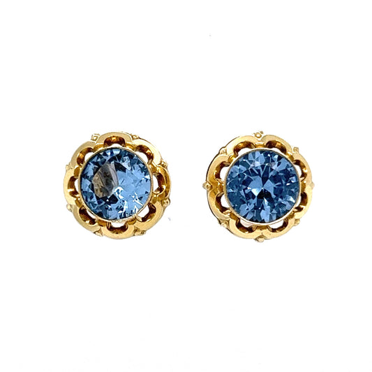 Bezel Set Blue Zircon Stud Earrings in 14k Yellow Gold