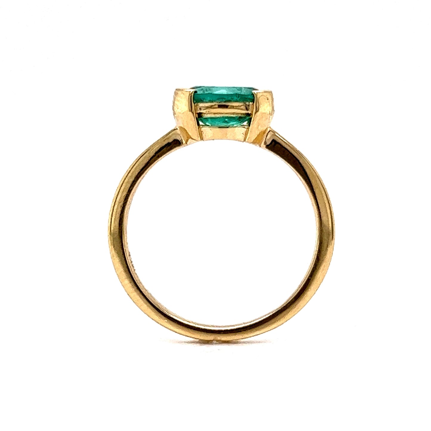 Half Bezel Set Oval Cut Emerald Ring in 14k Yellow Gold