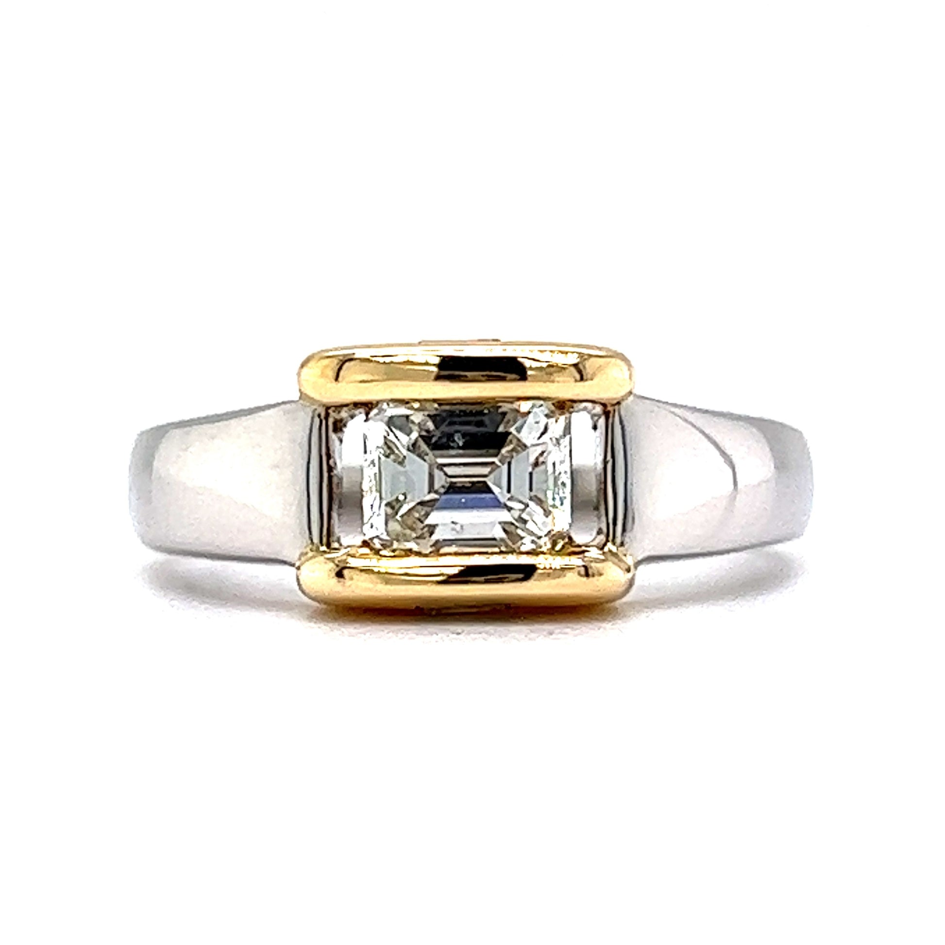 Modern Emerald Cut Diamond Engagement Ring in 18k Platinum