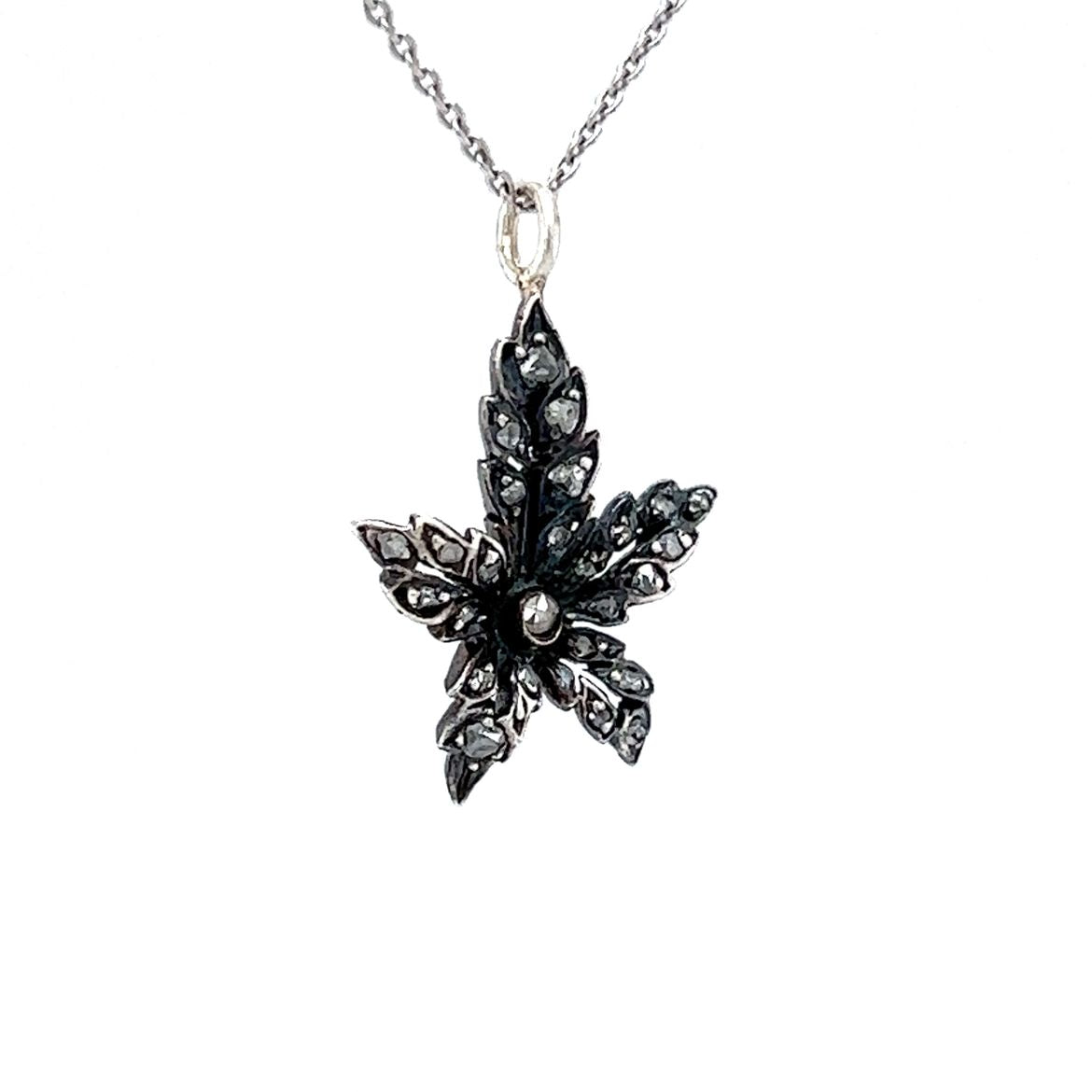 Georgian Diamond Leaf Pendant Necklace in Silver & 14kComposition: 14 Karat White Gold/Sterling Silver Total Diamond Weight: .17ct Total Gram Weight: 2.8 g Inscription: 14KT (chain)
      
