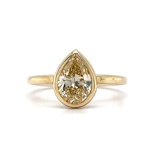 1.51 Fancy Yellow Pear Cut Diamond Engagement Ring in 14k Gold