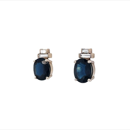 Oval Cut Sapphire and Diamond Earrings in 14K White Gold